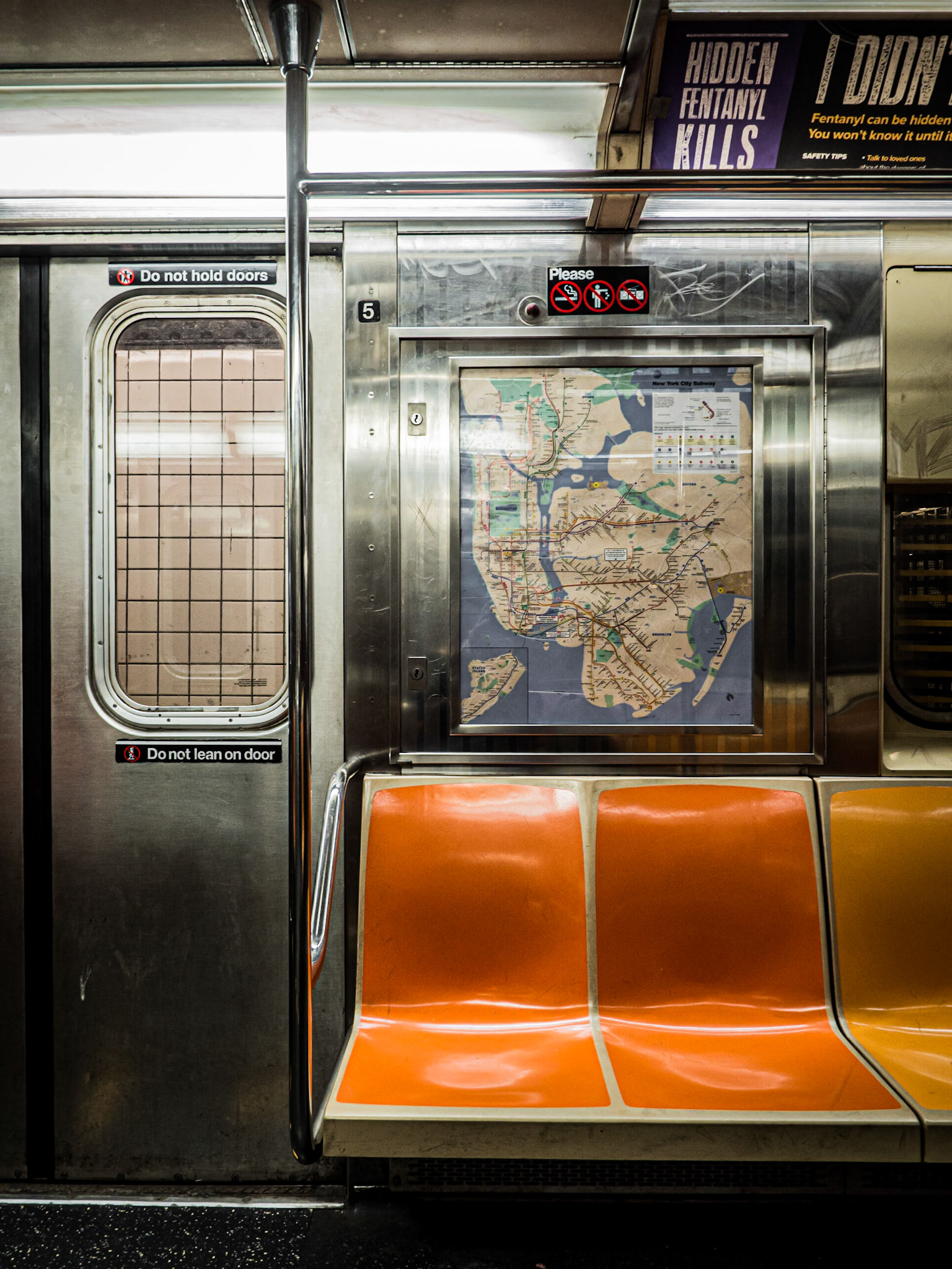 Empty seats on a subway car in New York