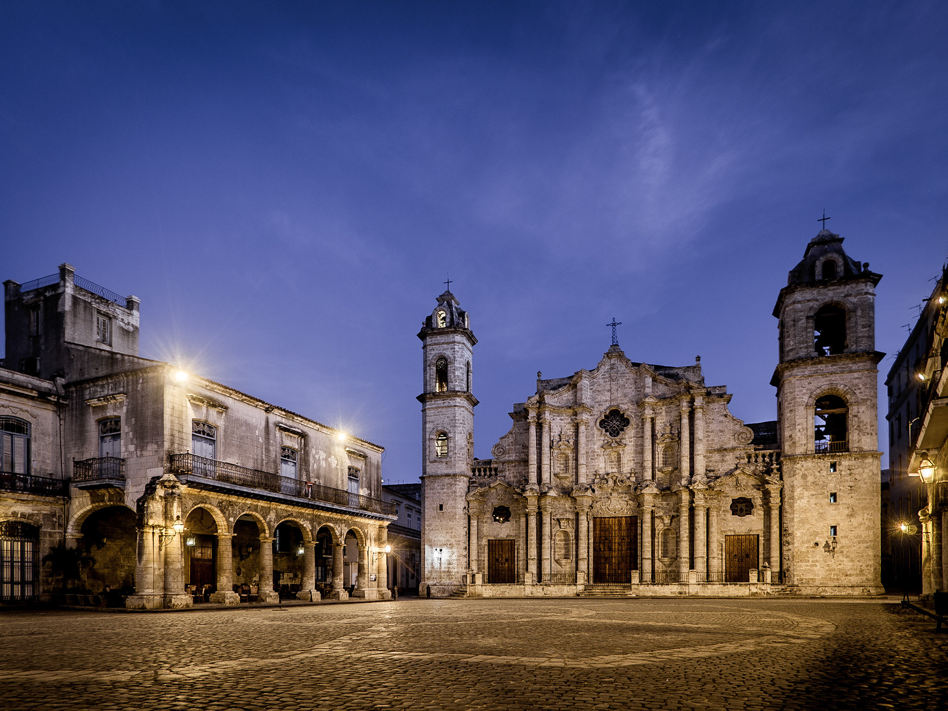 Dawn rises behind the Catedral de San Cristobal in the Cuban capital, Havana