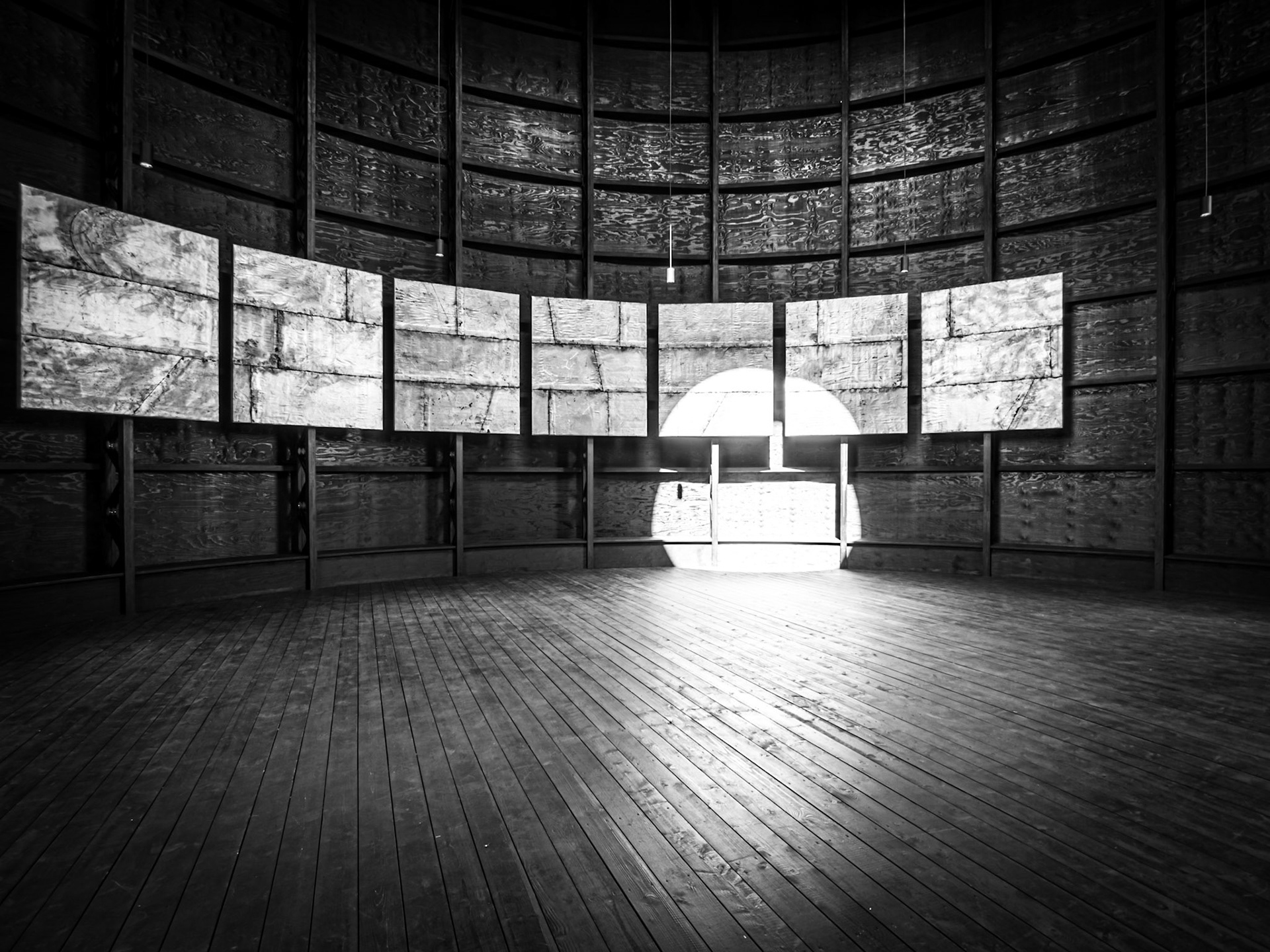 The sun focused on the wooden interior of a contemporary art installation