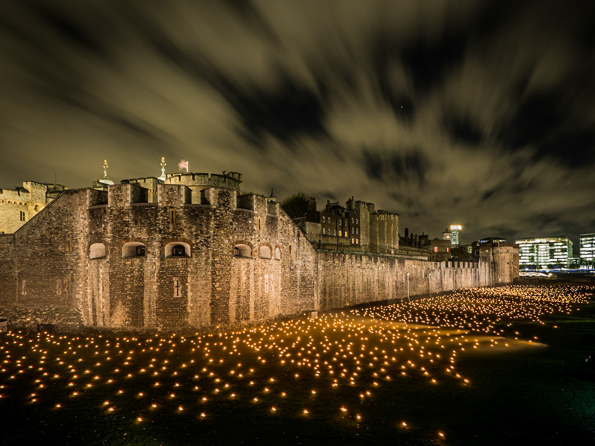 Thousands of torches are lit in the grounds of the Tower of London to commemorate the centenary of World War I