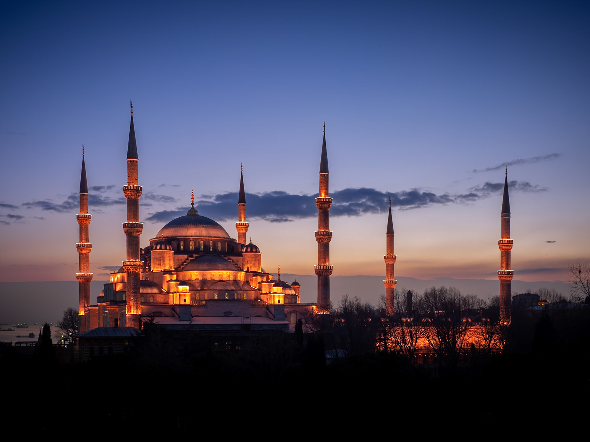 Sunset falls behind the Blue Mosque, situated in the Old City of Istanbul in Turkey