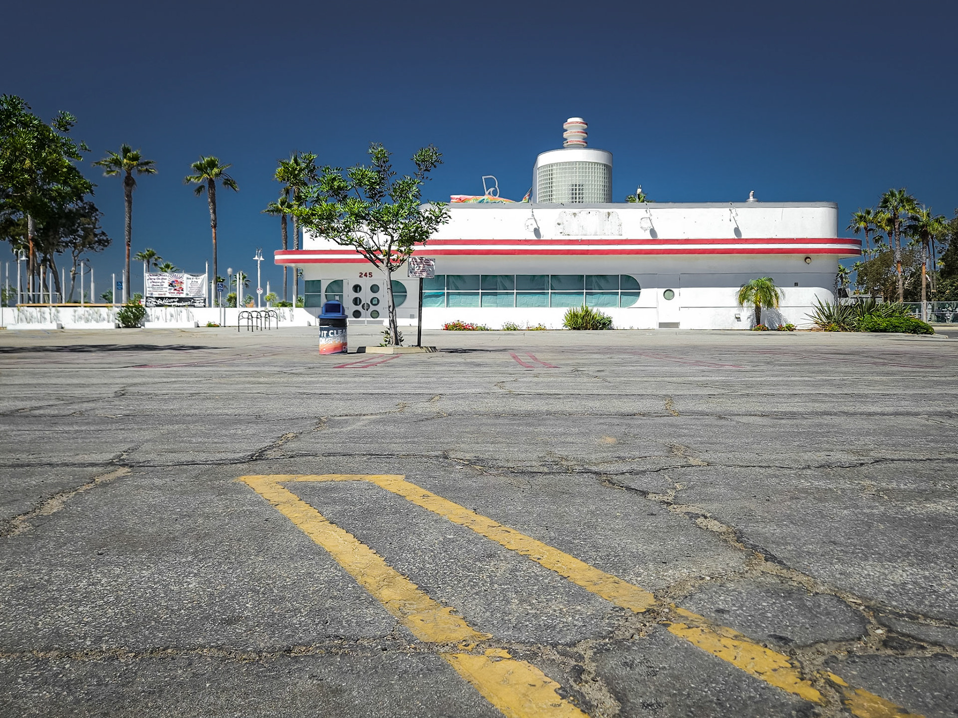 A dilapidated diner sits lone in a deserted car park in southern Los Angeles