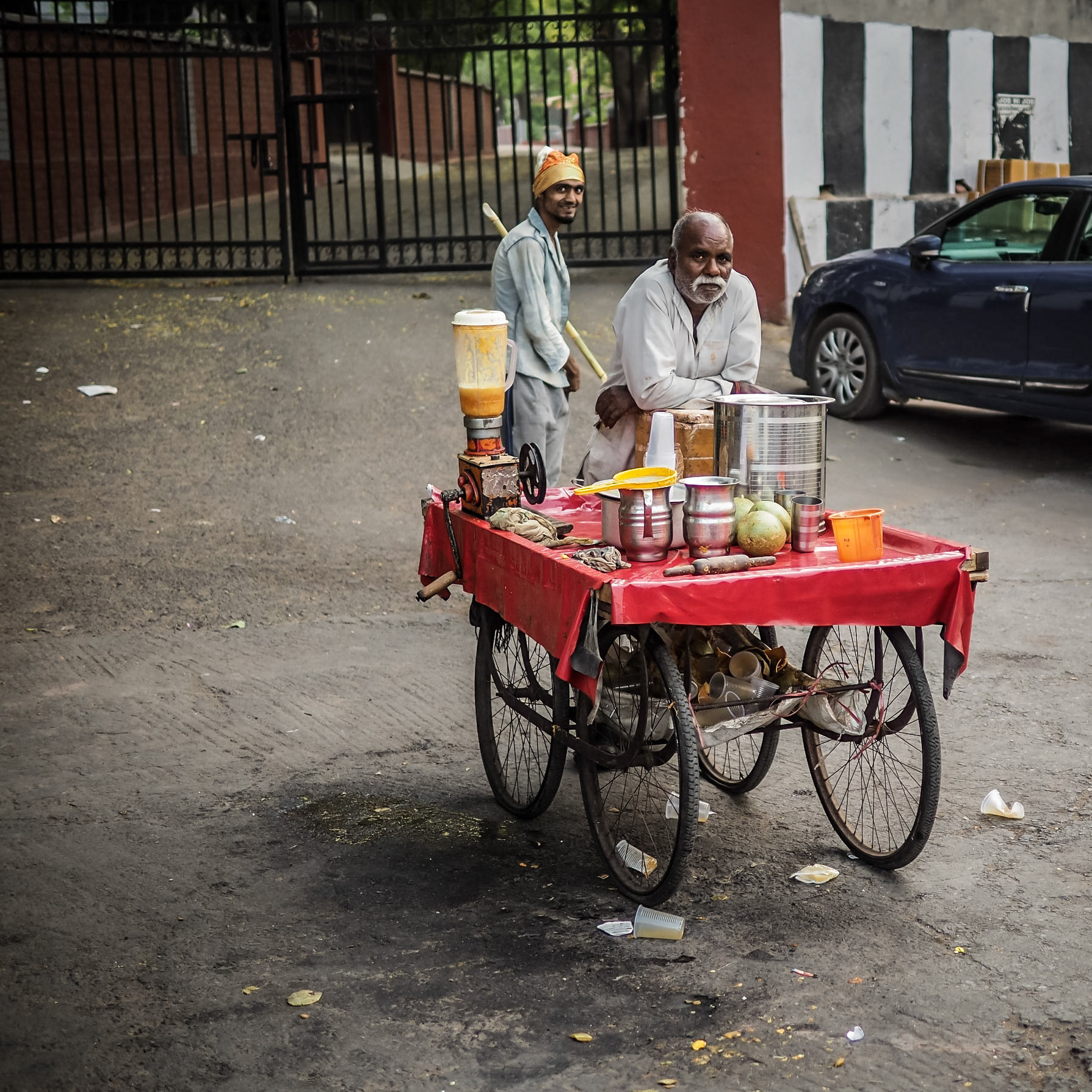 A juice-seller awaits passing trade in the Chandni Chowk market district of New Delhi