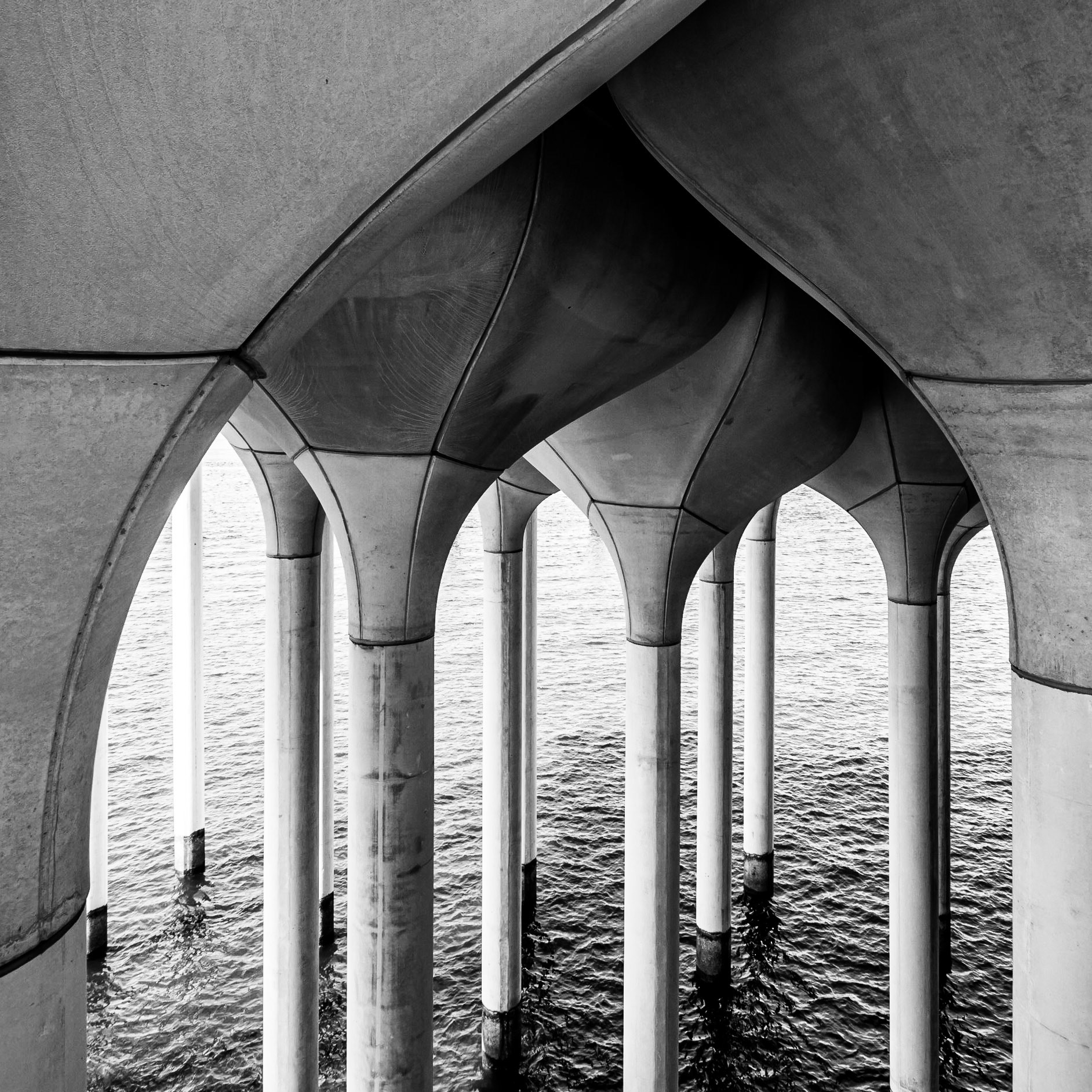 Pillars supporting the upper levels of Little Island on the banks of the Hudson river in New York City