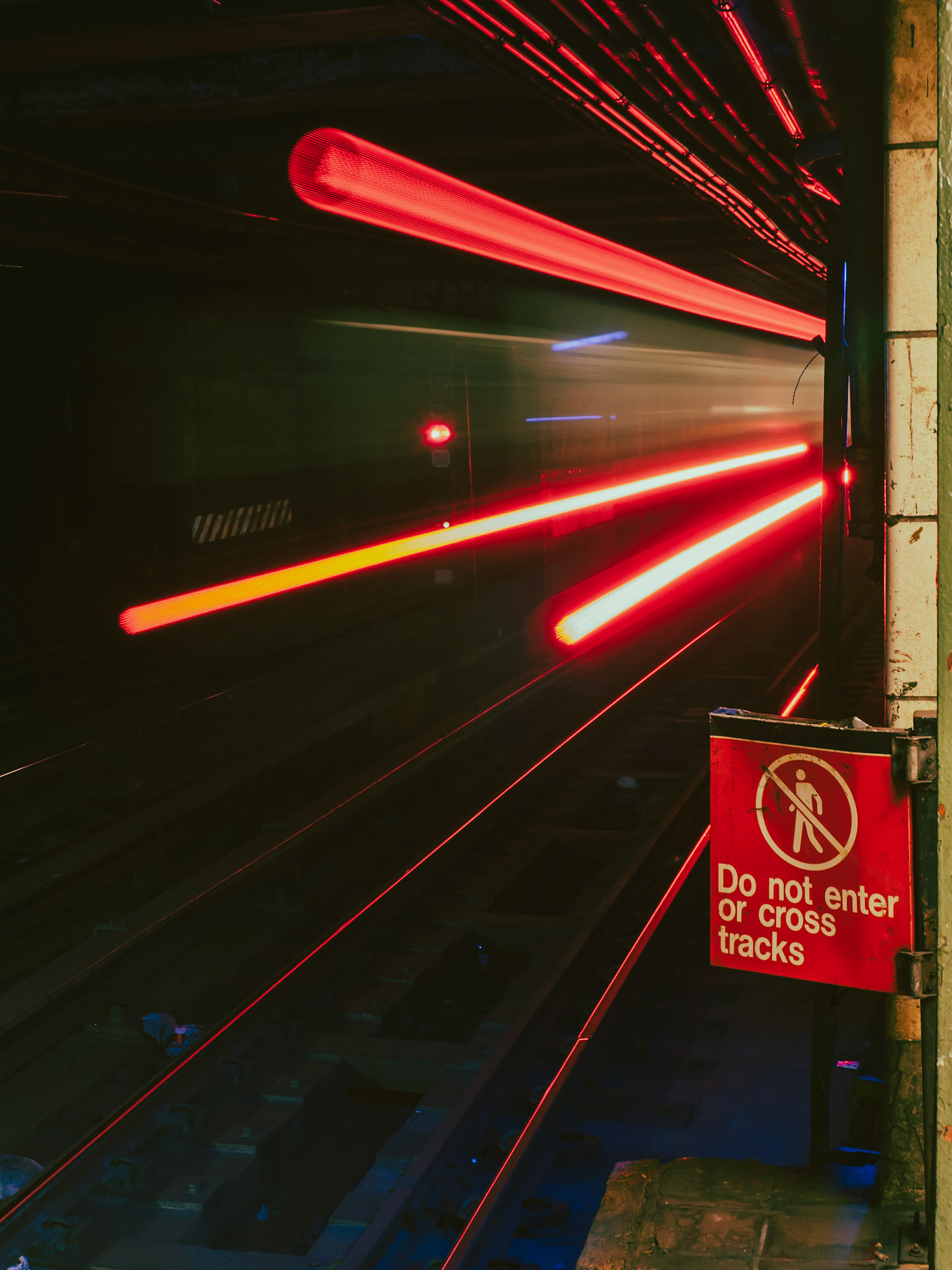 The tail lights of a No. 4 subway train during the evening rush-hour in New York City