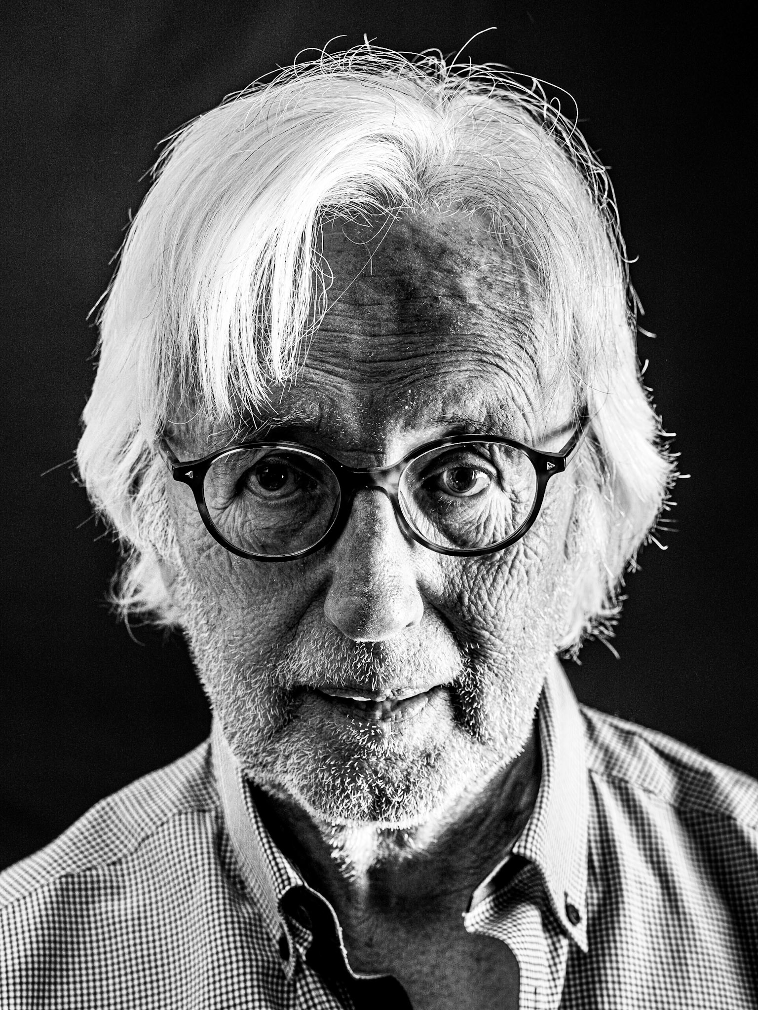 A black and white portait of Alan, the grizzly grandfather