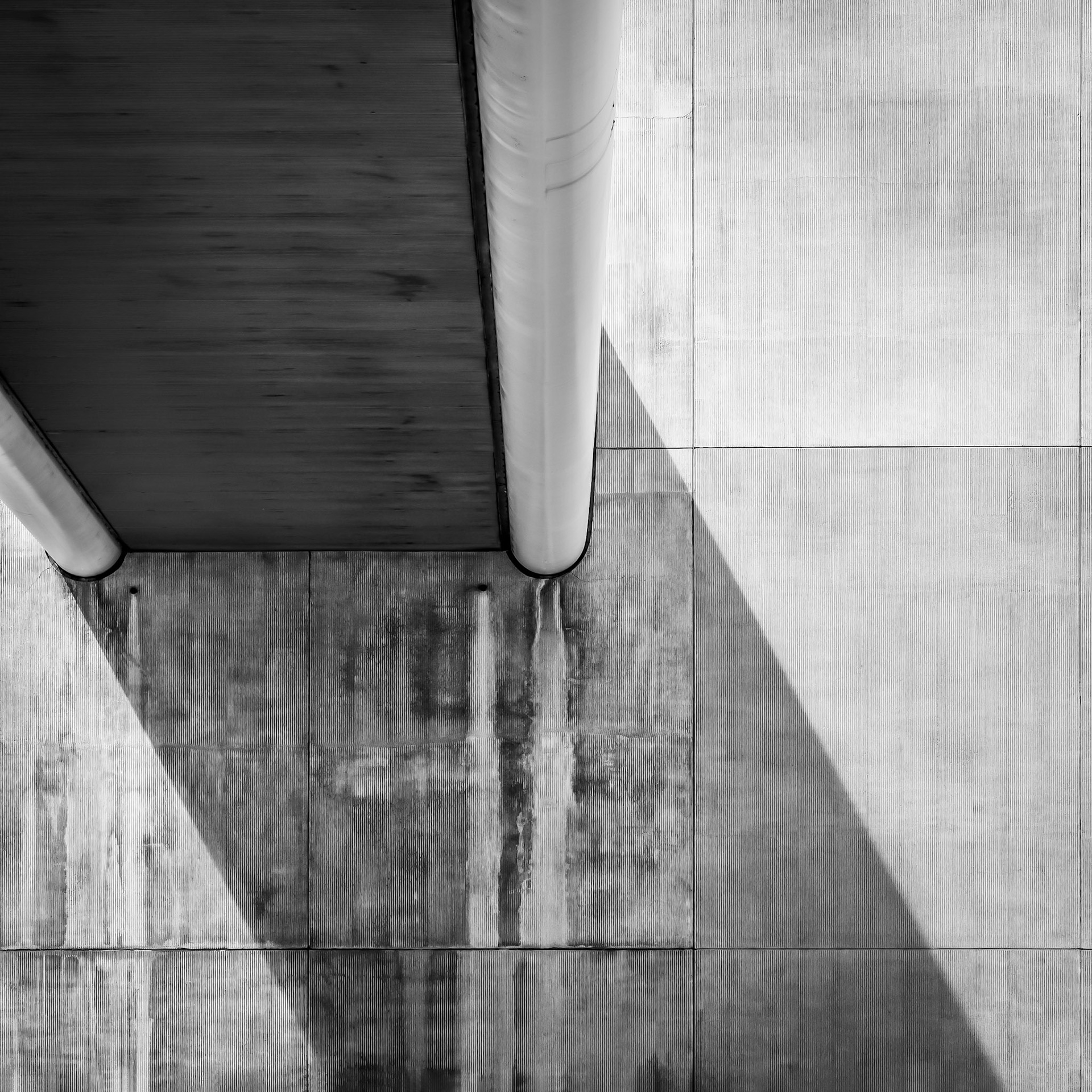 A bridge in downtown Los Angeles links two brutalist buildings