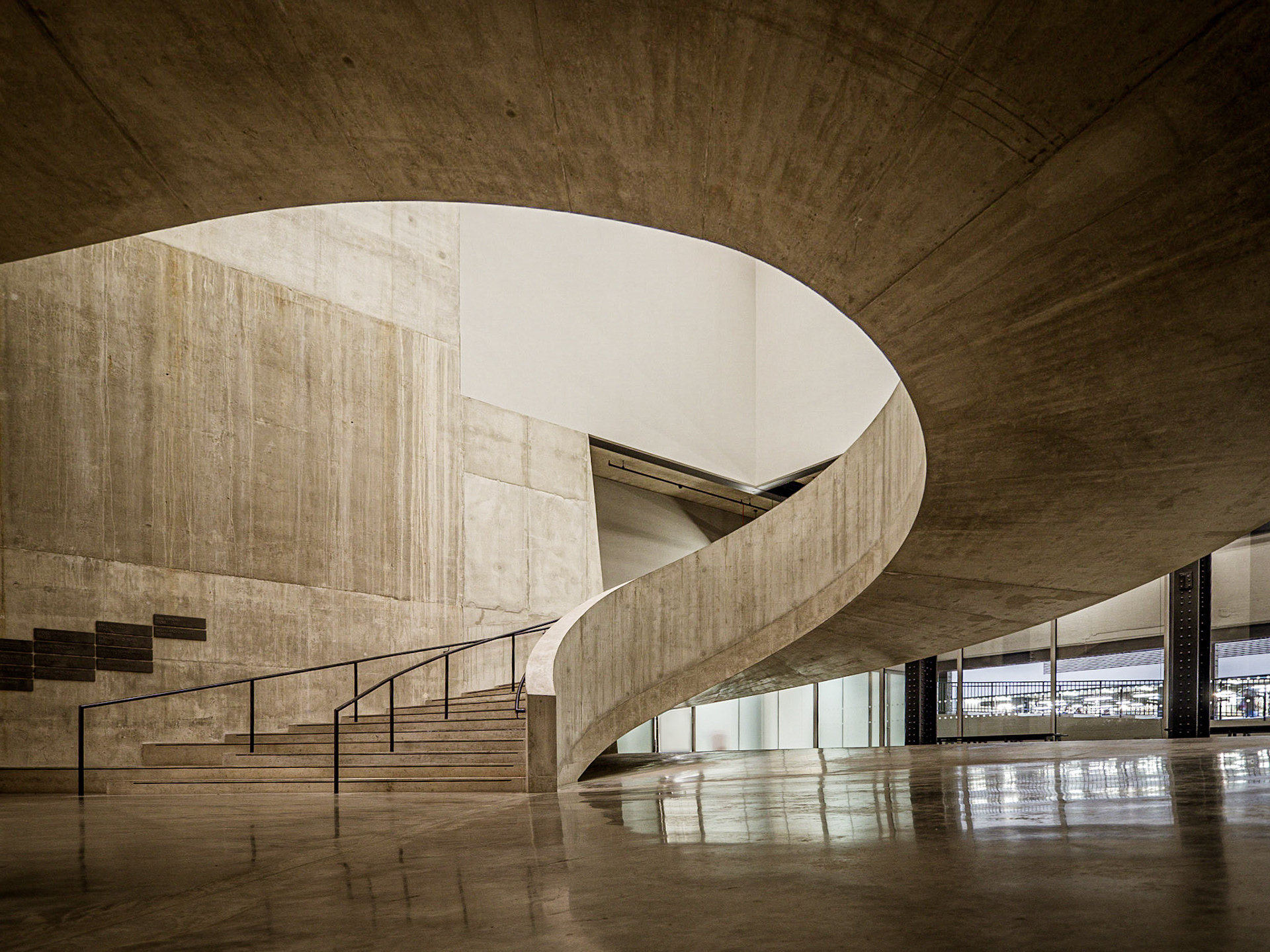 The geometric curves of a staircase at the Tate Modern in London