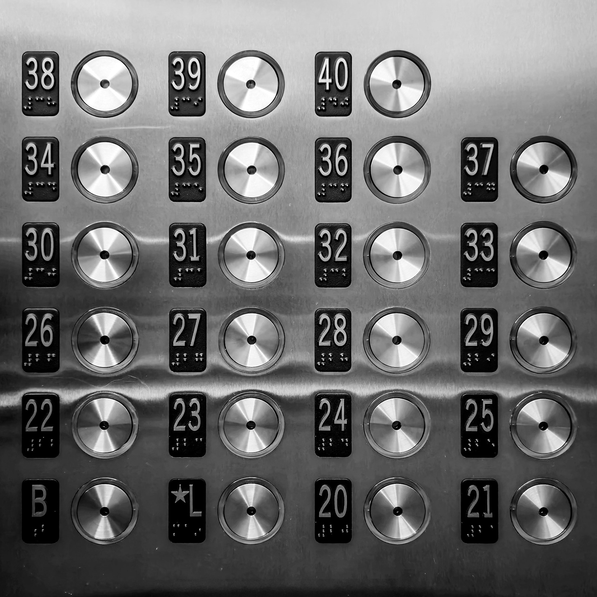 A collection of buttons stands out in an elevator of an old hotel in Manhattan, New York