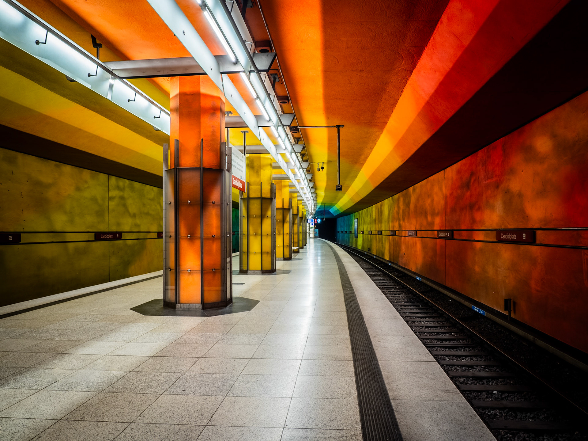 A rainbow of colours adorns the walls of a station on the U-Bahn in Munich