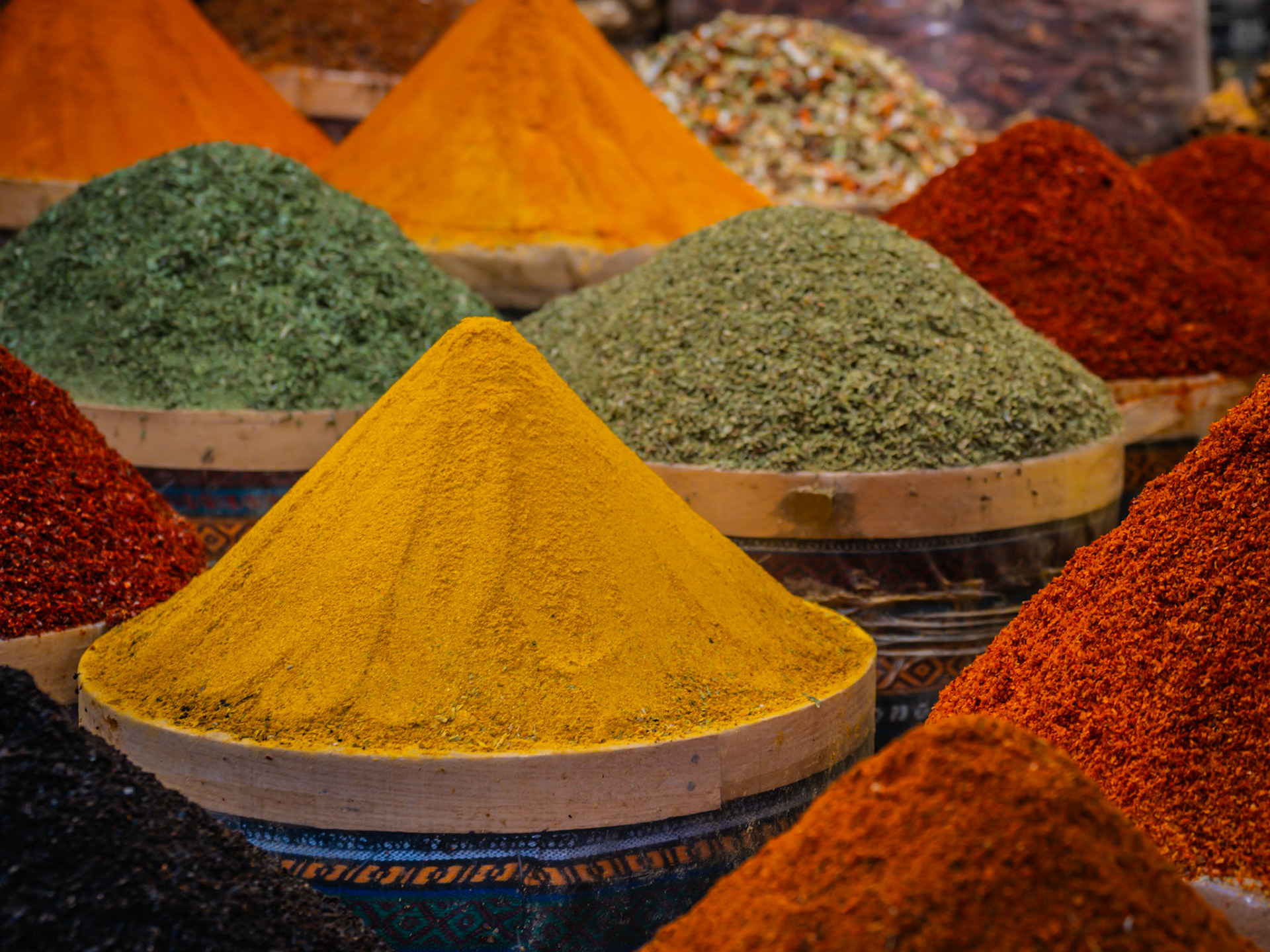 Barrels of vibrant-coloured spices for sale in the Egyptian Bazzar in the ancient city of Istanbul