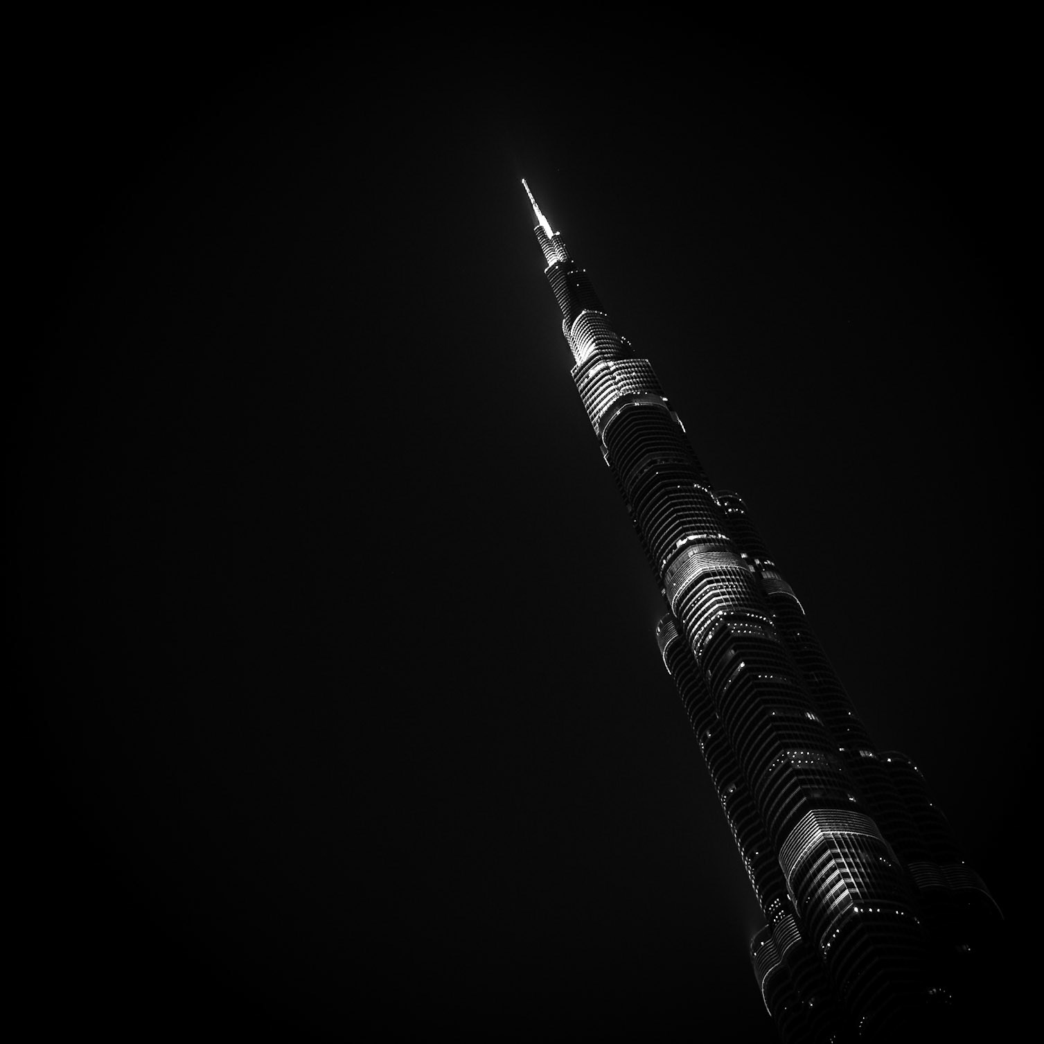 The tallest building in the world, Burj Khalifa, stands out in the night sky above Dubai