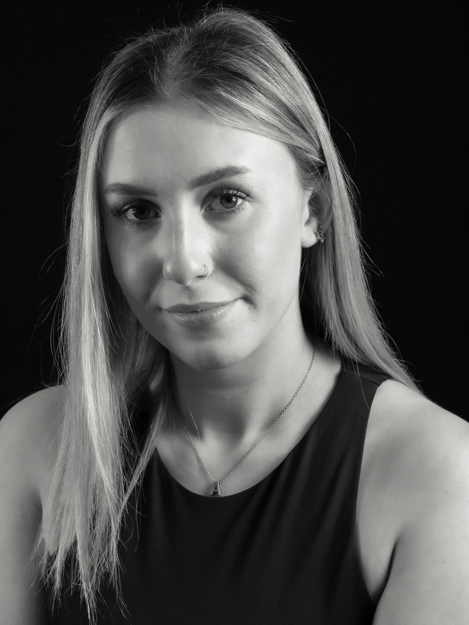 A black and white portrait of an aspring actress and singer