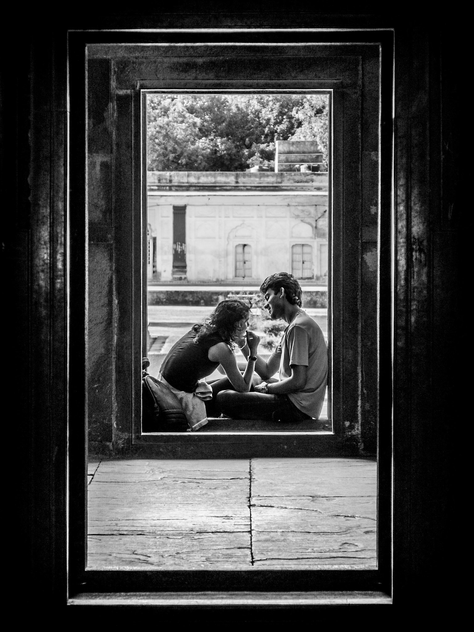 A couple courting in the grounds of the Safdarjung Tomb in New Delhi