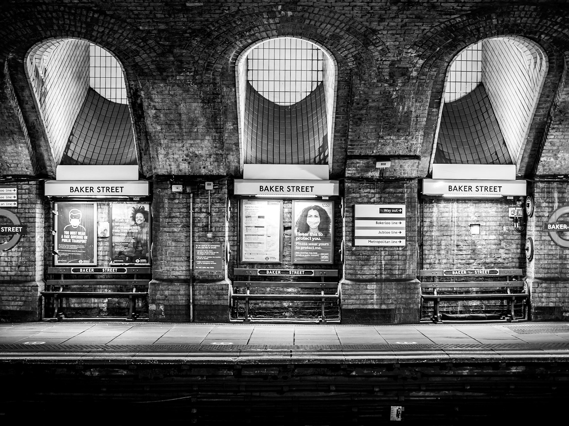 Arches overhang the platform at Baker Street Tube station, one of the oldest on the network