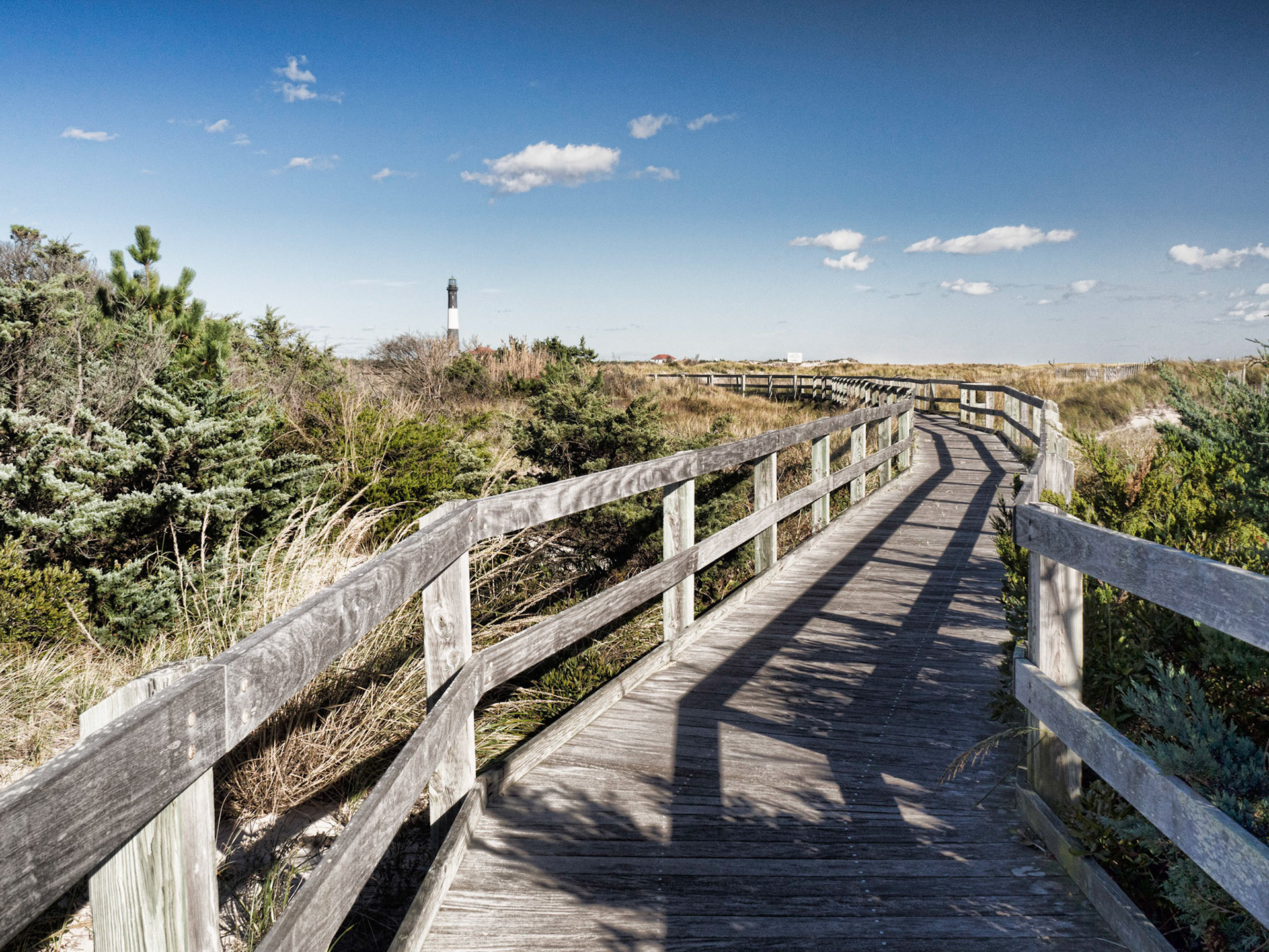 A boardwalk leading to the lighthouse on Fire Island, Long Island