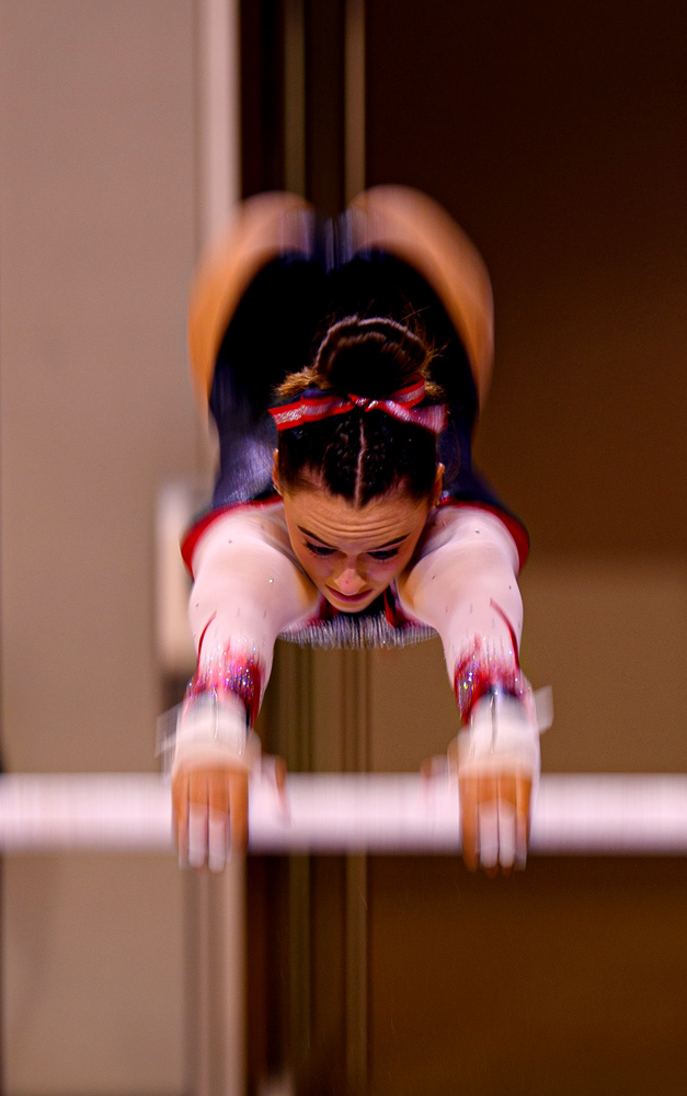Emily Shepard performs on the uneven bars on Feb. 27, 2021.