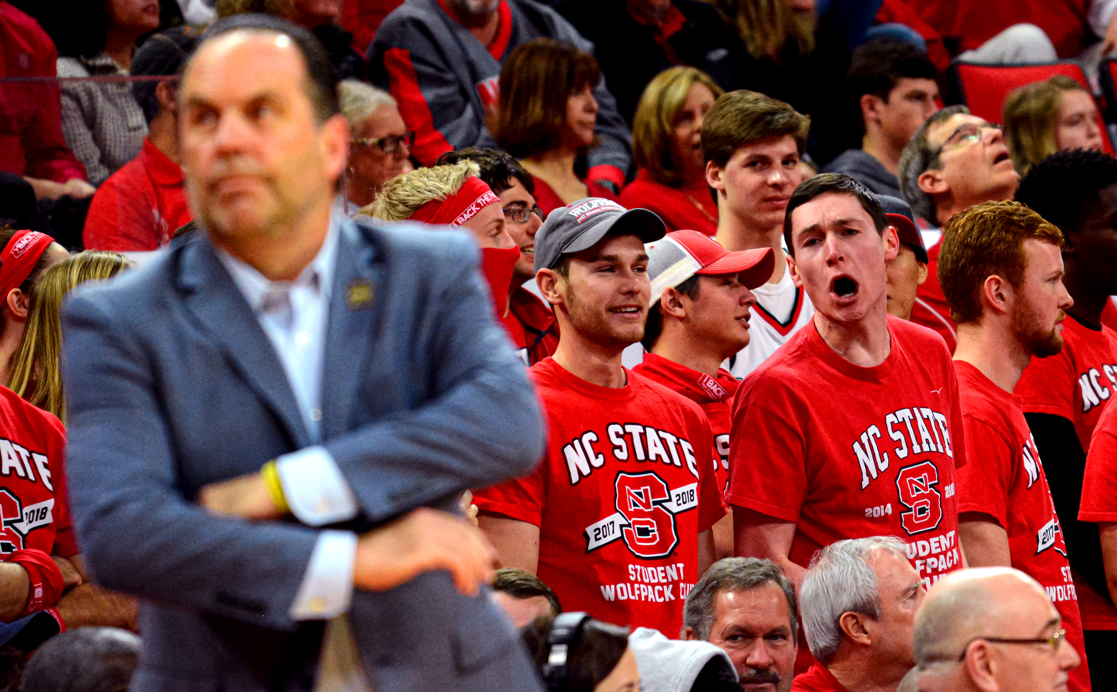 A student heckles Notre Dame coach Mike Brey on Feb. 3, 2018.