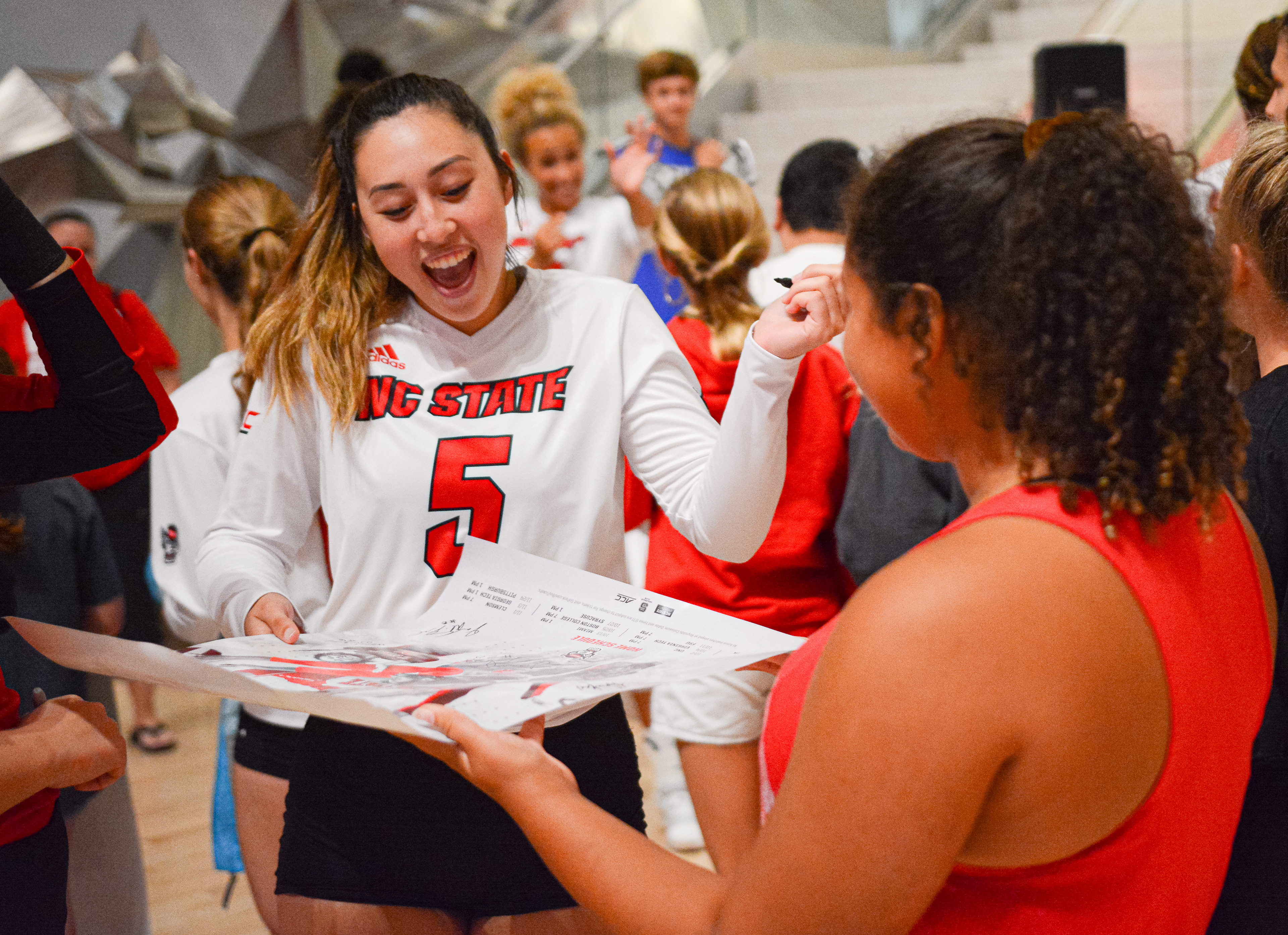 Kristen McDaniel signs an autograph after the Red/White Scrimmage on Aug. 24, 2019.