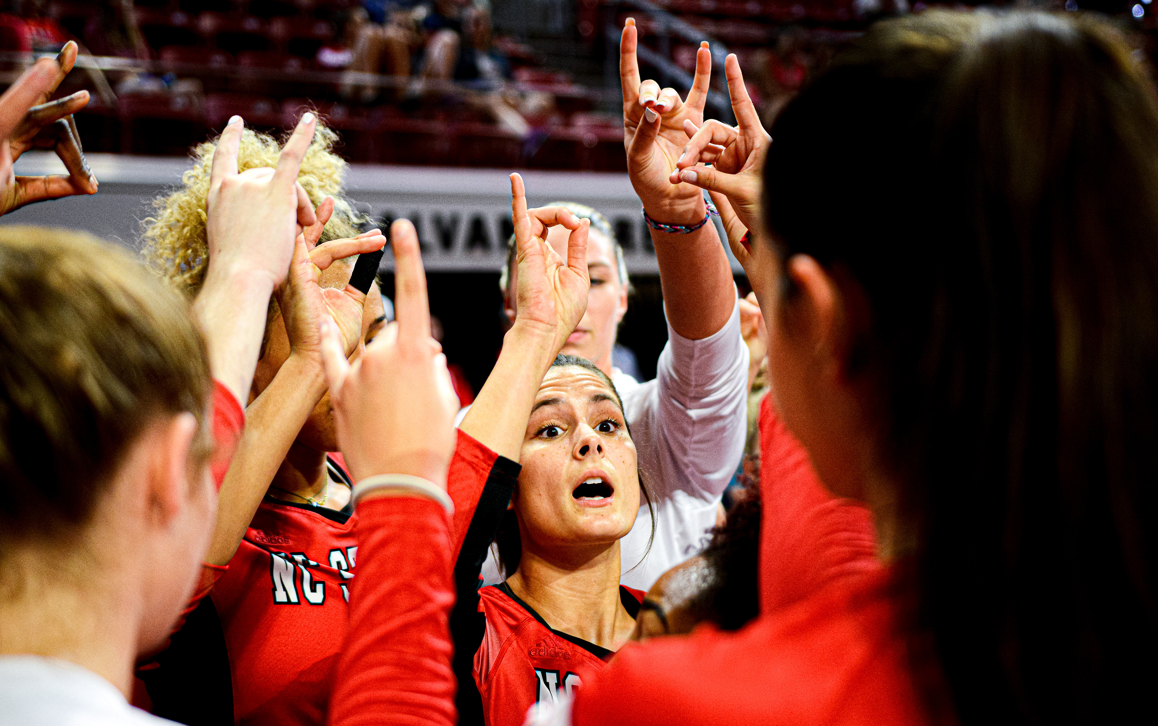 Grace Irvin breaks down a huddle before the Red/White Scrimmage on Aug. 24, 2019.