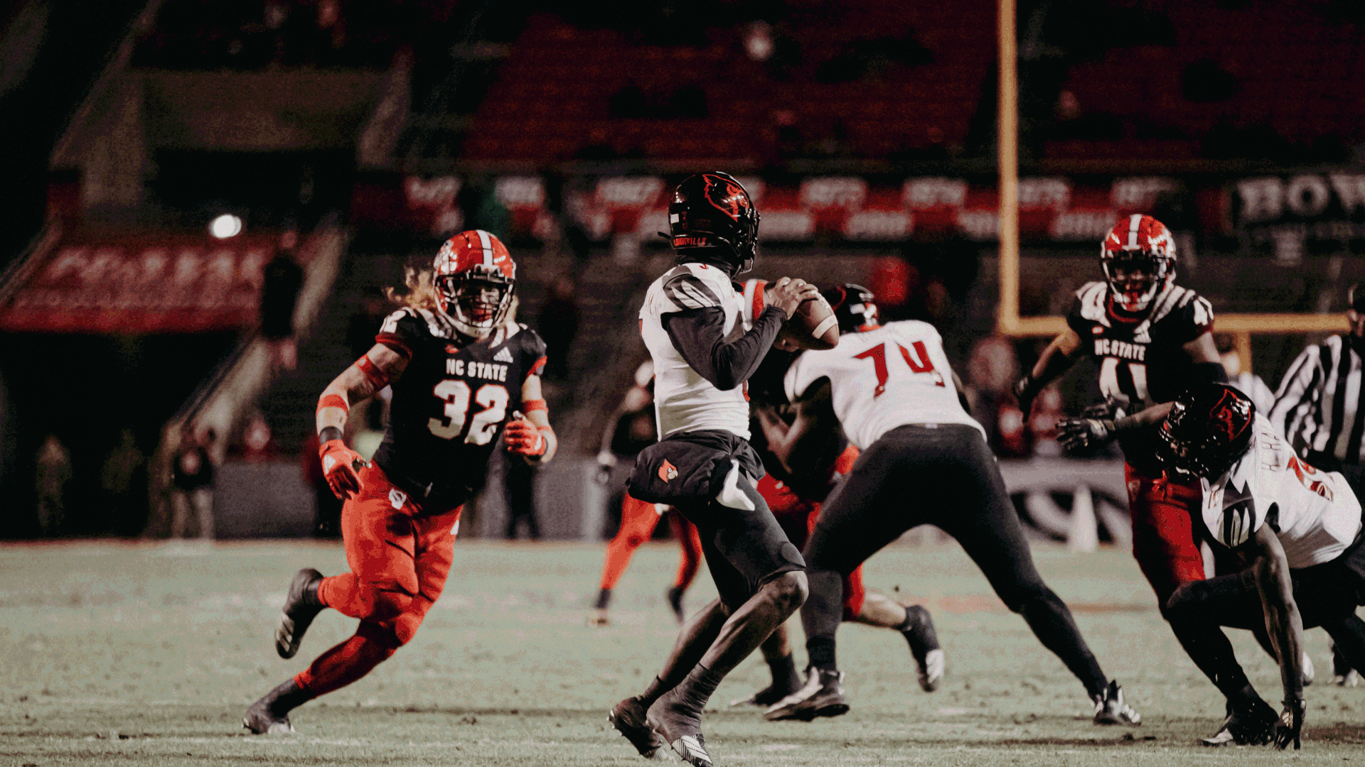 Drake Thomas sacks Louisville's Malik Cunningham.