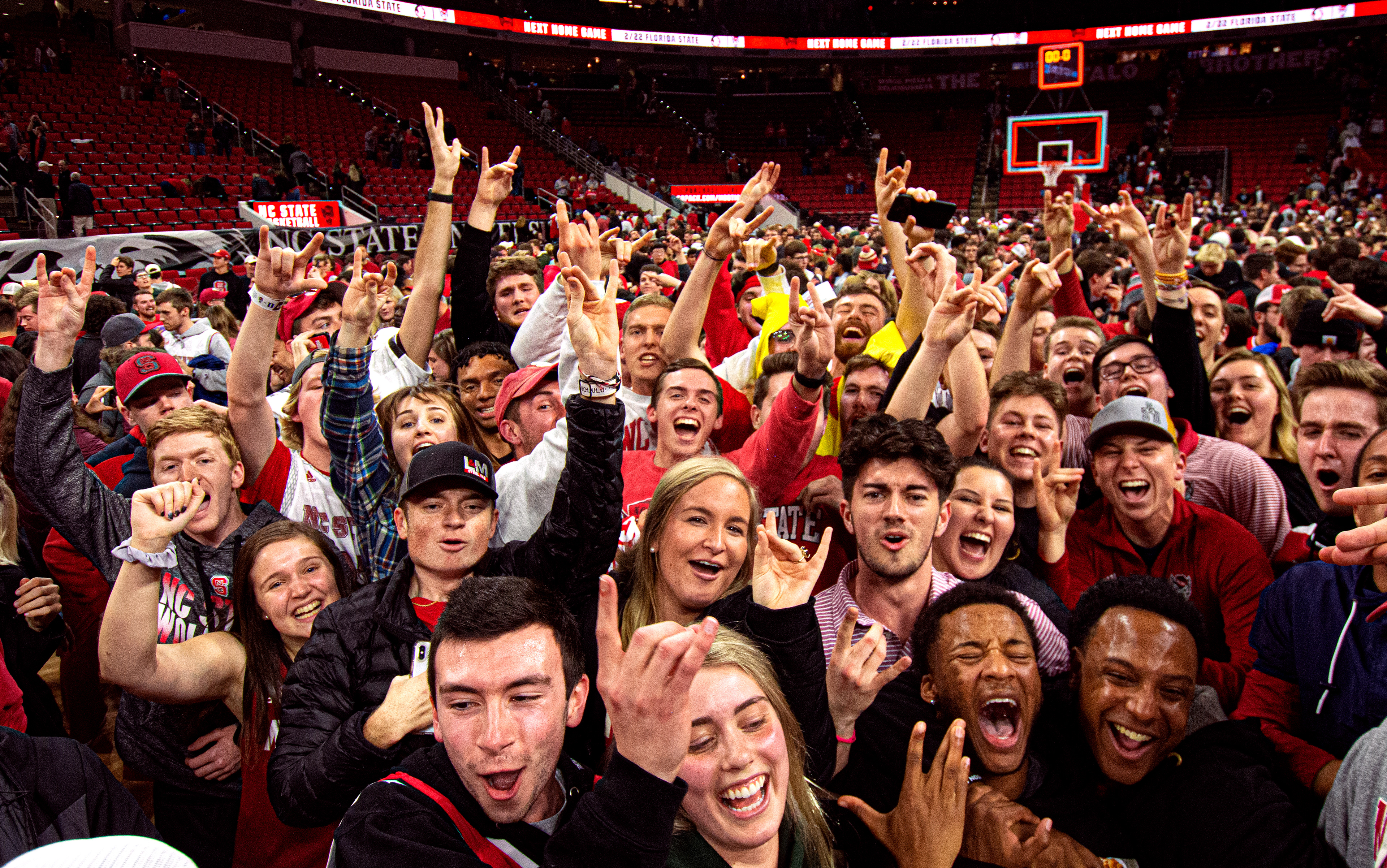 Students celebrate the 88-66 blowout.