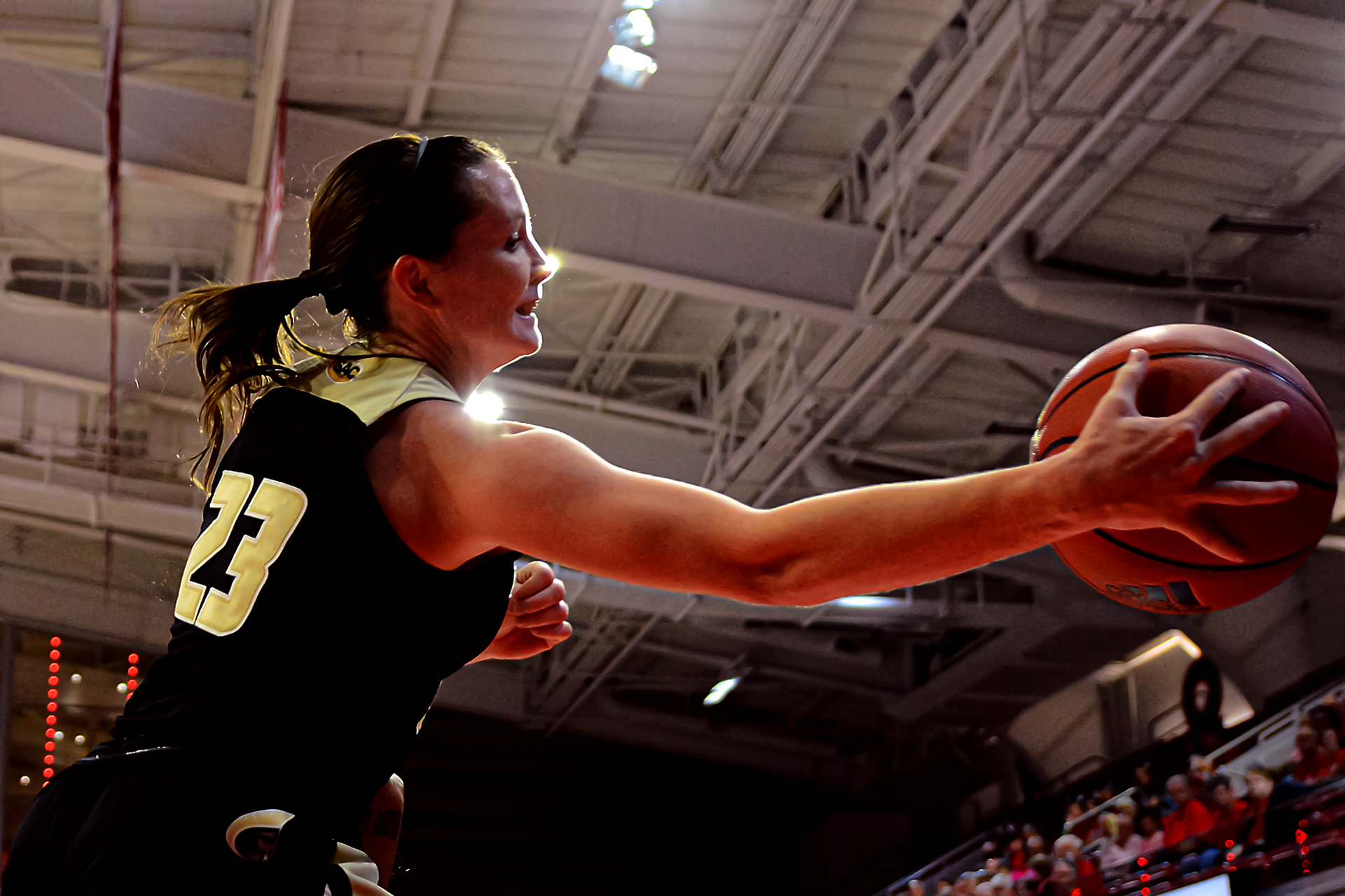Madison Baggett attempts to save a loose ball from going out of bounds.