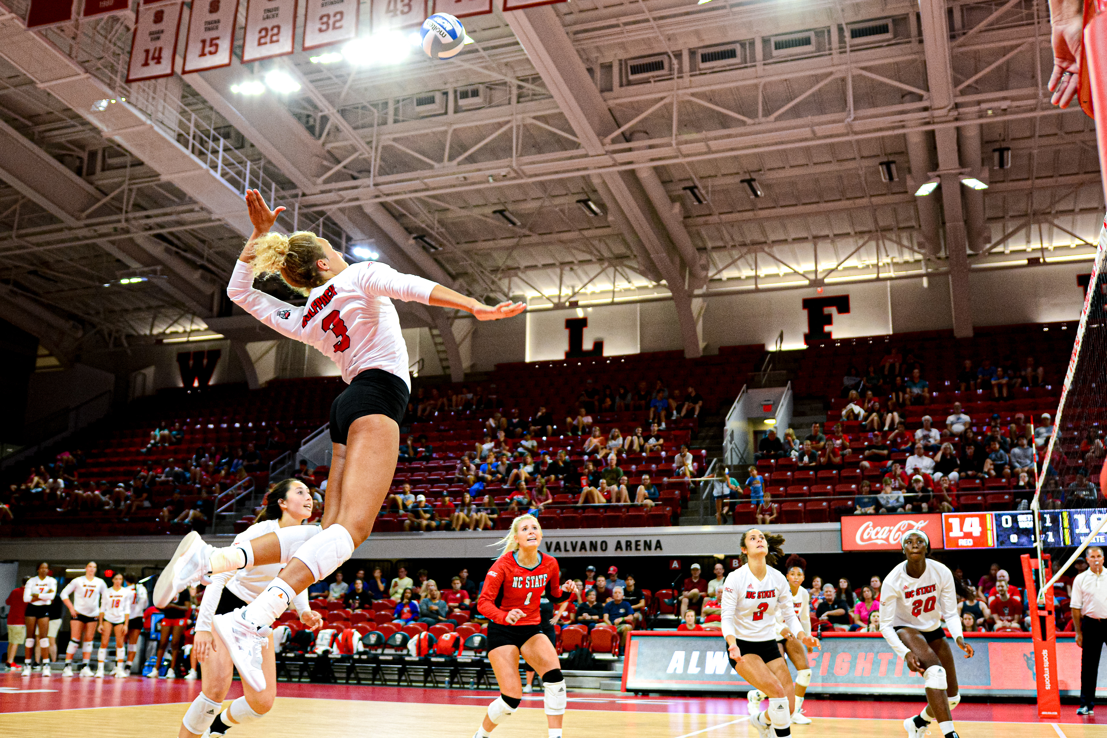 Melissa Evans leaps during the Red/White Scrimmage on Aug. 24, 2019.