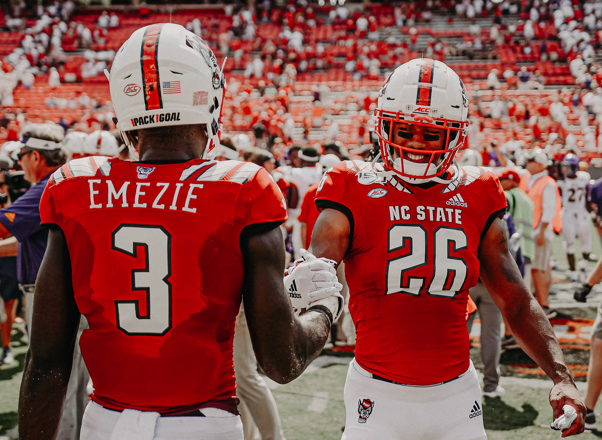 Trent Pennix greets Emeka Emezie after beating ECU on Aug. 31, 2019.