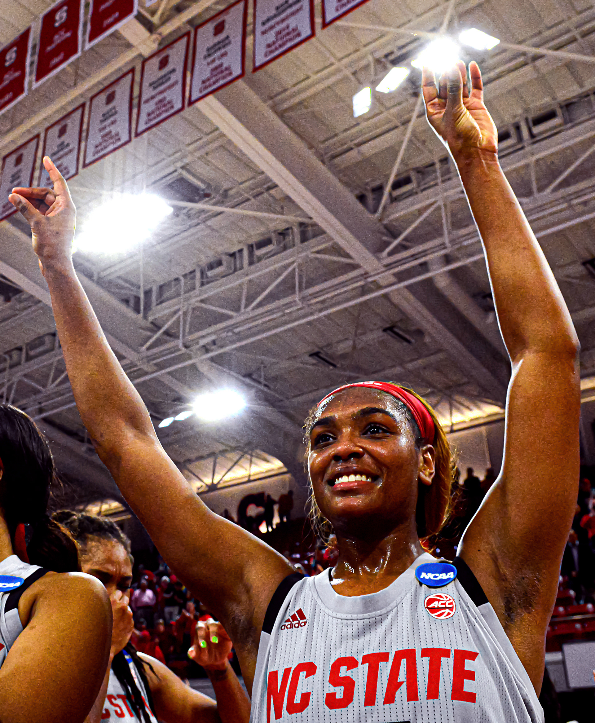 Senior Kiara Leslie celebrates her final game in Reynolds Coliseum, helping the Wolfpack to a second straight Sweet Sixteen after a second round win on March 25, 2019.
