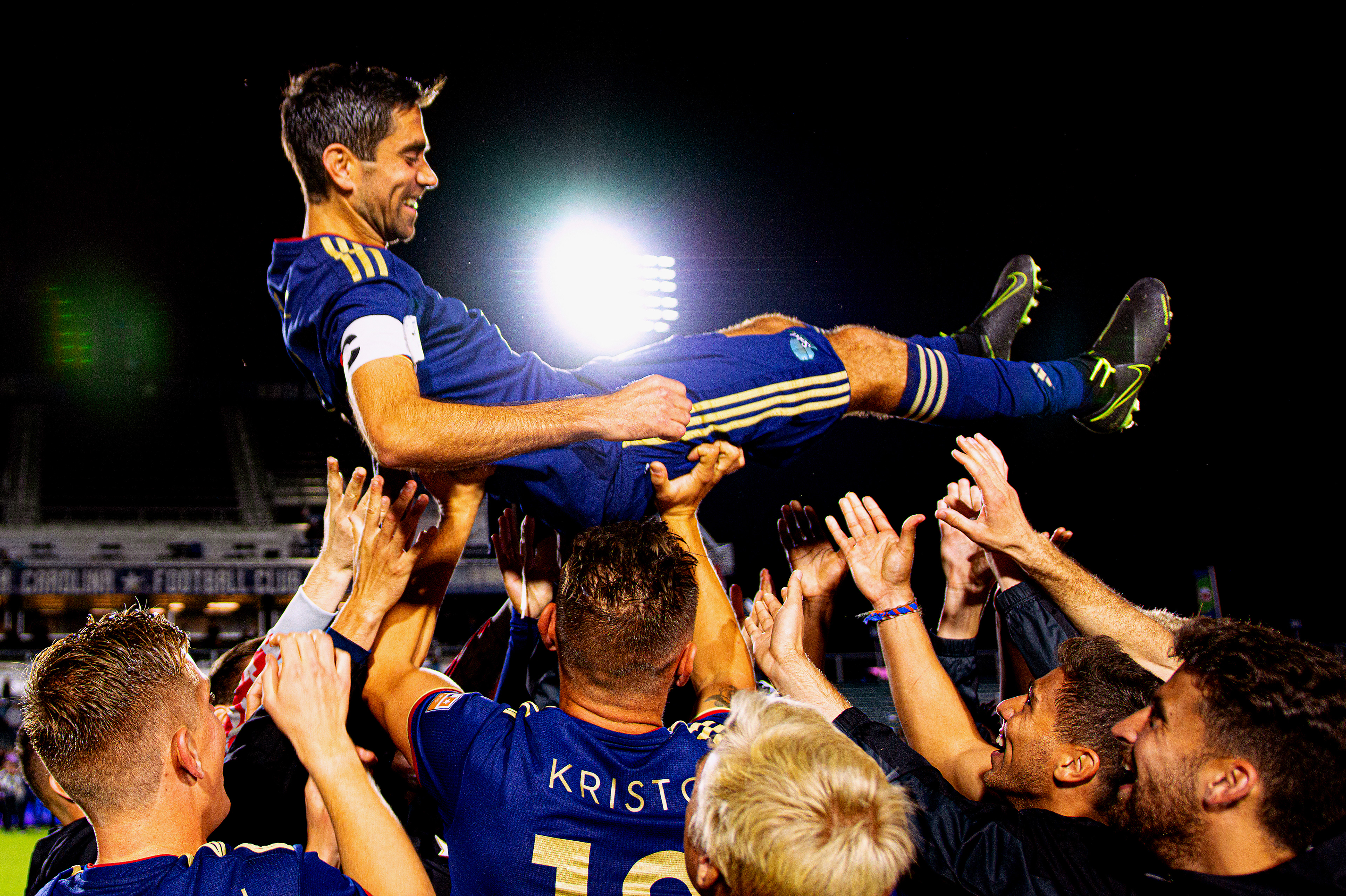 Teammates celebrate Austin da Luz's final regular season home game on Oct. 19, 2019.