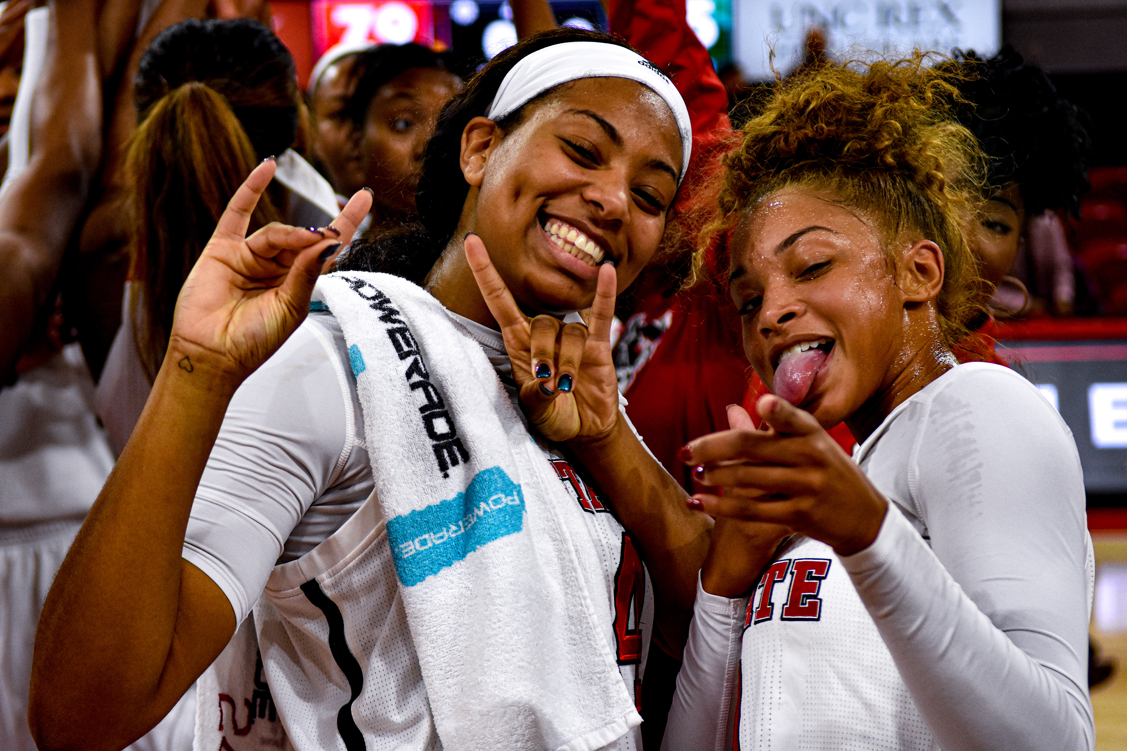 Erika Cassell and Lucky Rudd celebrate the win over Tulane on Dec. 3, 2017.