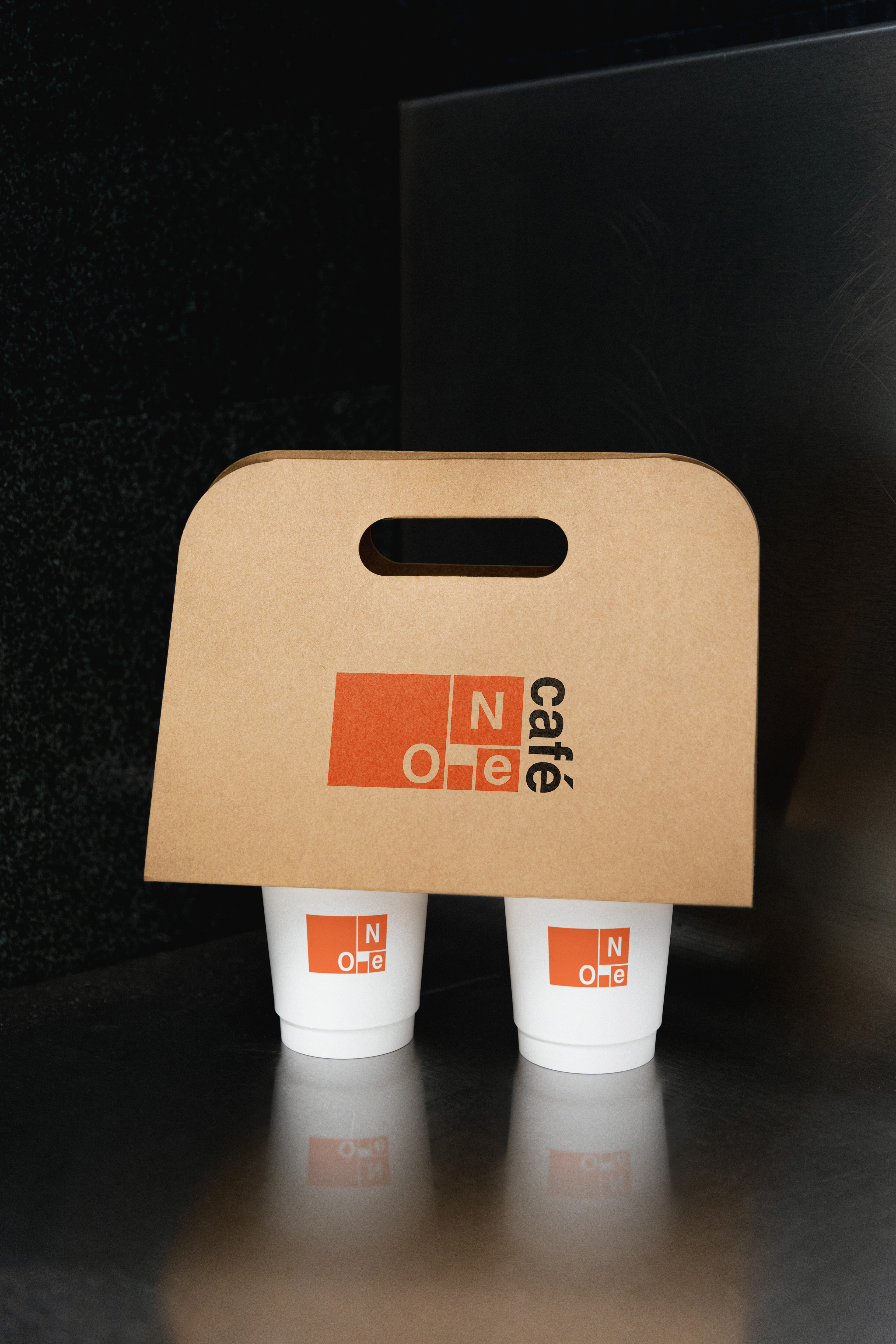 Takeaway cups and carrier