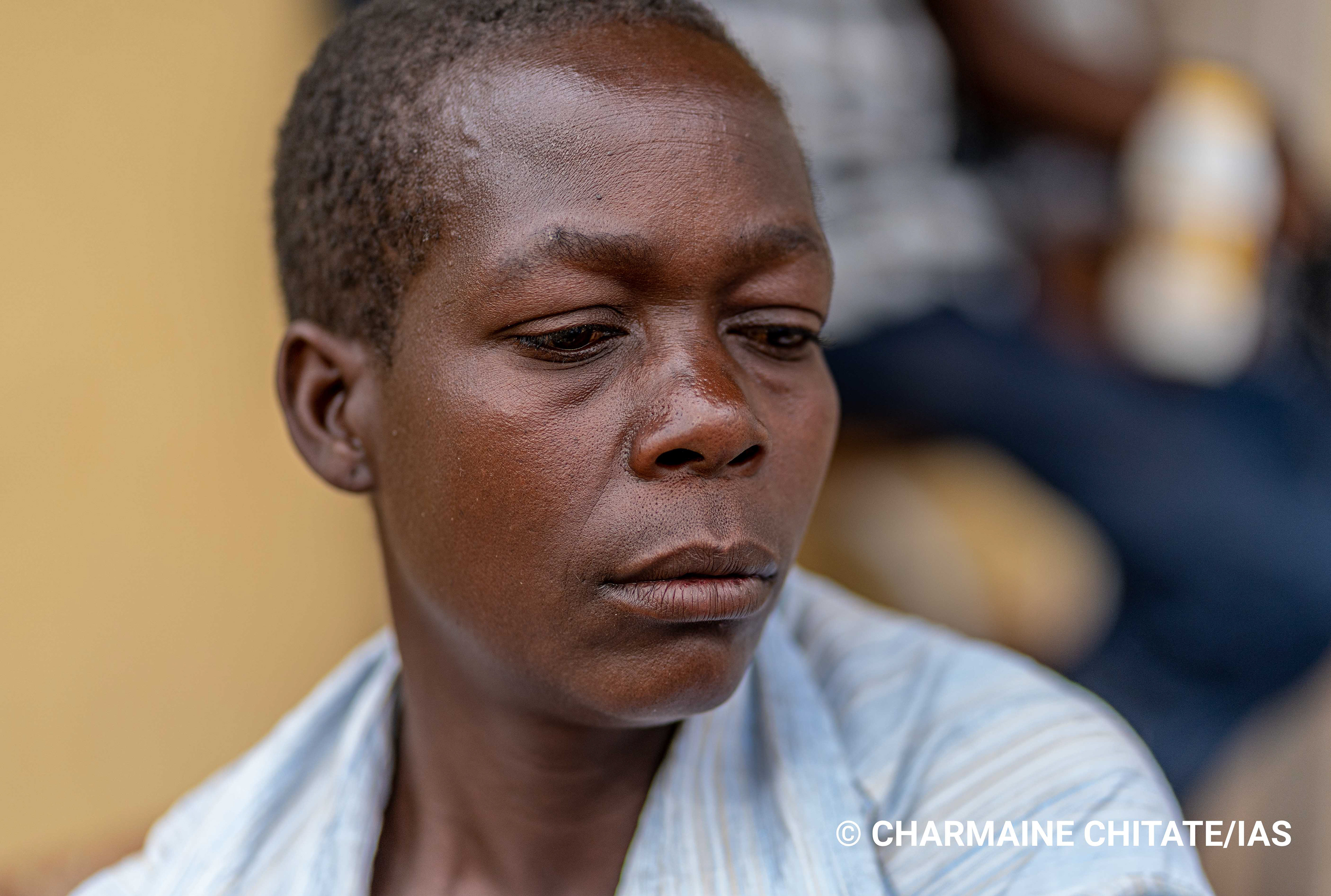 Mayase Sere is living with HIV and hopes her children will live to take care of her when they are old enough to work. (Photographer: Charmaine Chitate/IAS)