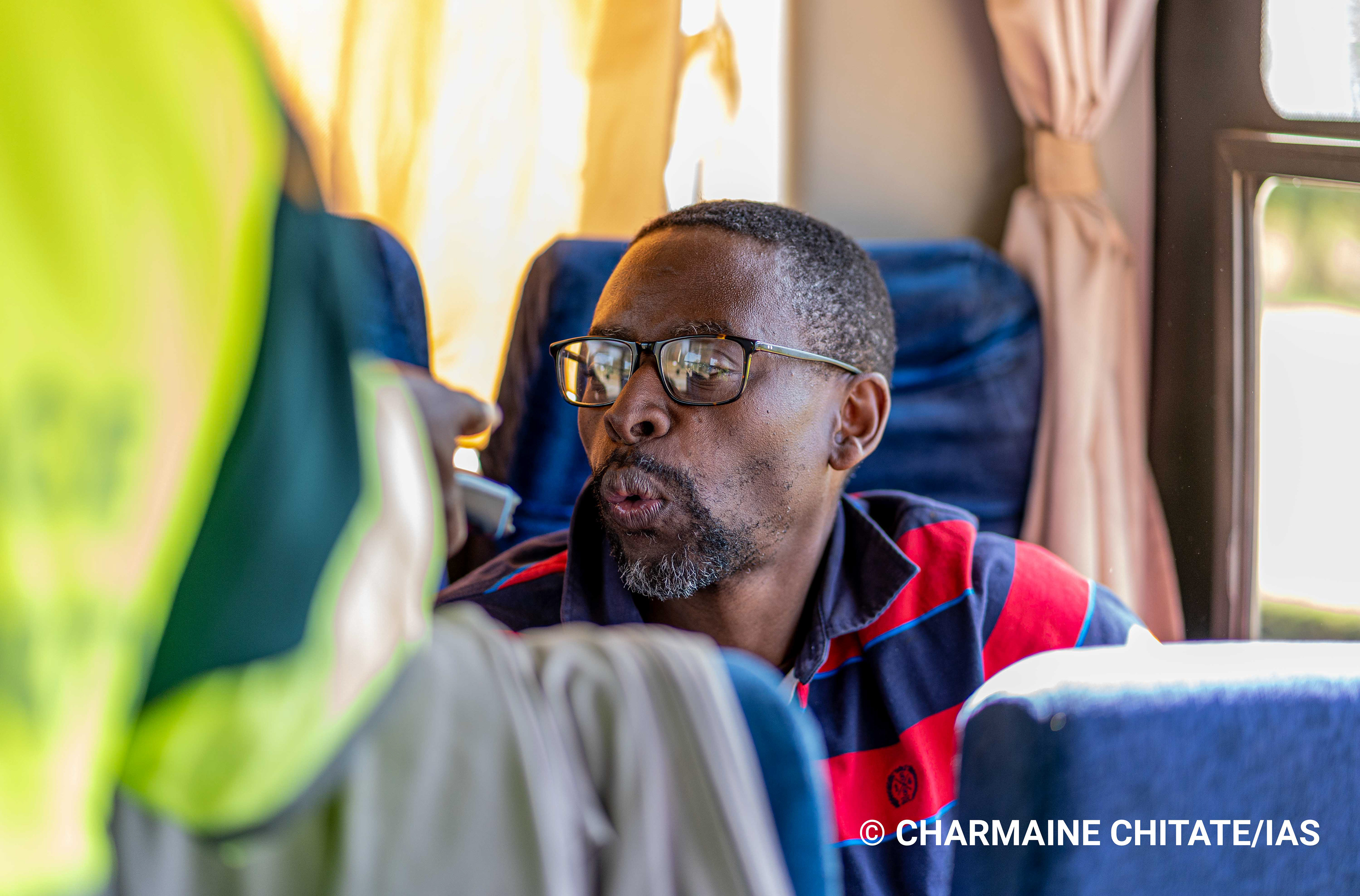 Agence France-Presse (AFP) Photojournalist, Jekesai Njikizana blows into a breathalyser at ZIMPLATS Ngezi Mine as part of entry requirement at the mine. (Photographer: Charmaine Chitate/IAS)