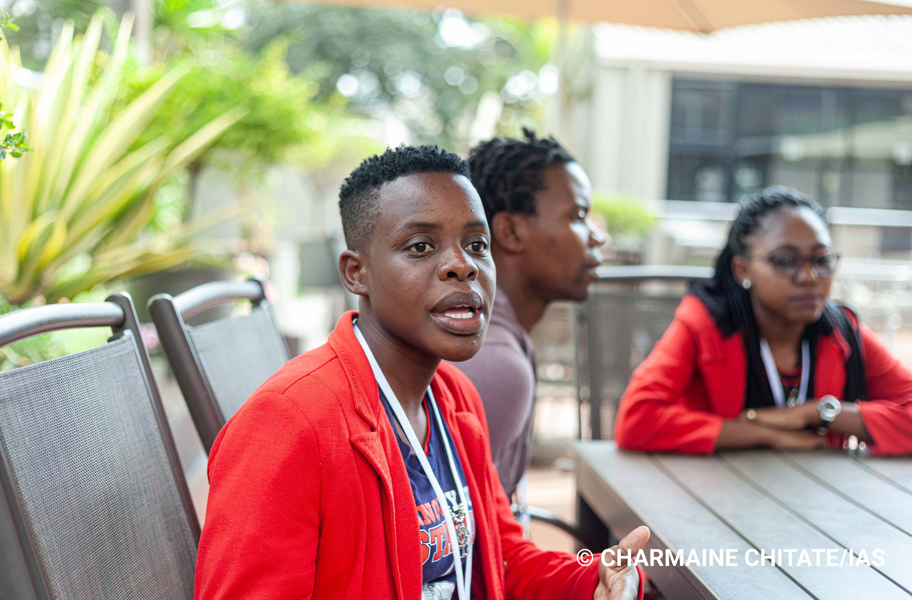 Rumbidzai Chidora (24), a Technical Support Team Intern with AfricAID Zvandiri, shares the highlights from a panel discussion she was a part of during the "Translating Science to End HIV in Southern Africa" Conference held at the Holiday Inn Hotel on june 24 2019. (Photographer: Charmaine Chitate/IAS)