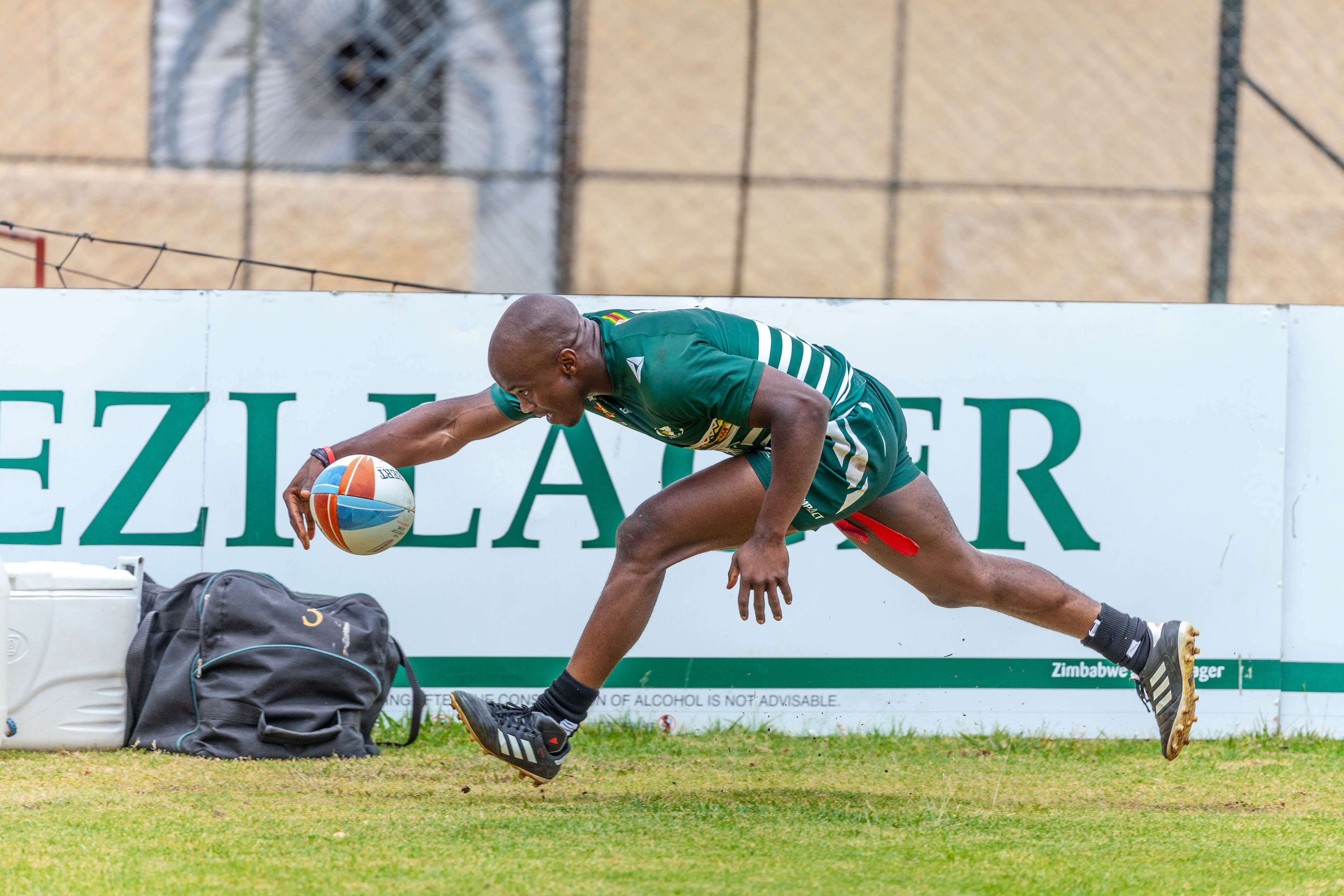 © Charmaine Chitate. Zimbabwe Speedstar Kudakwahe Chiwanza places a try for the Cheetahs against the Dragons.