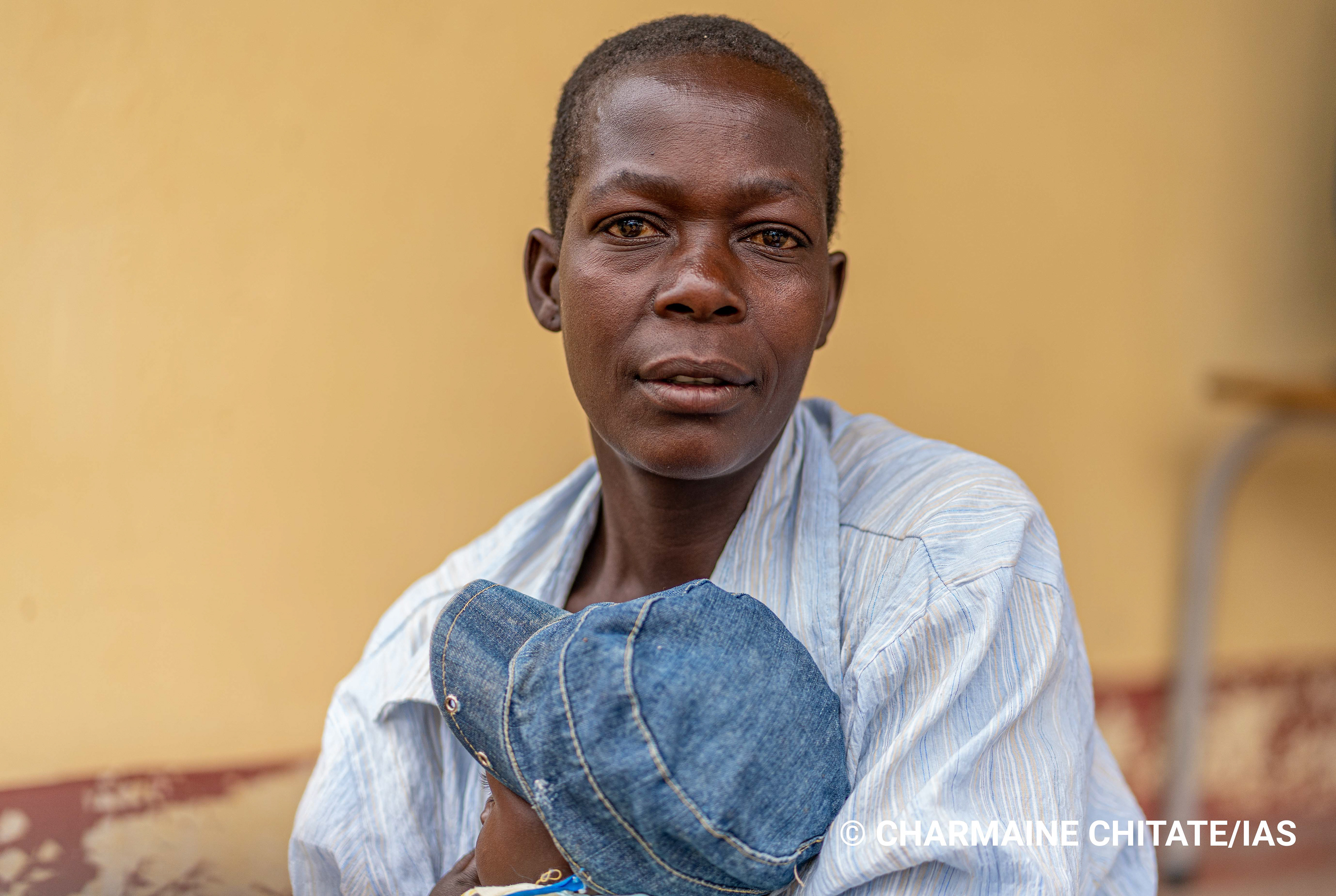 Mayase Sere is living with HIV and collects her antiretroviral treatment from Turf clinic in Ngezi. (Photographer: Charmaine Chitate/IAS)