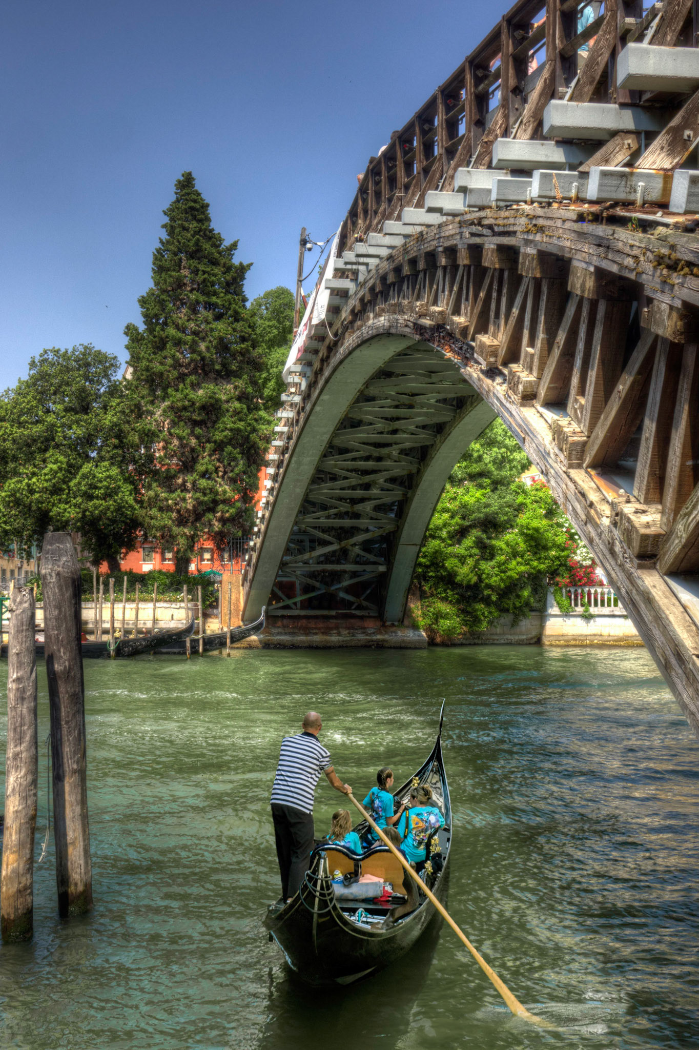 Just practicing selecting and refining in photoshop by placing this gondola onto an empty area of water. Does it work? How could it be improved?