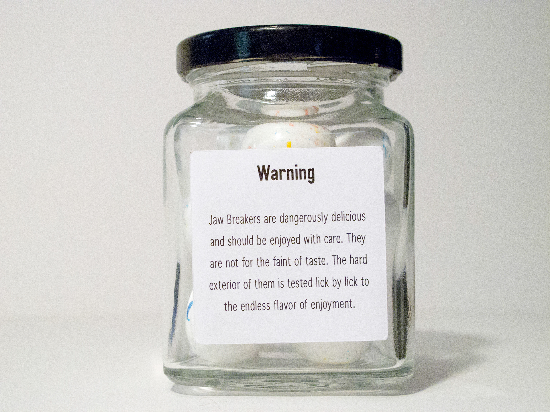 GDII Jaw Breakers Back A shot taken to show how delicious these jawbreakers are. They are labeled with "Warning" because of a sense of a tasty addiction and wonderful enjoyment!!