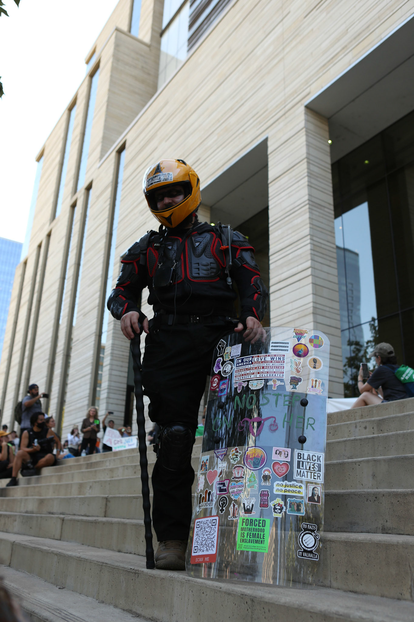 Protest security stands on the steps of the Federal Courthouse on June 24.