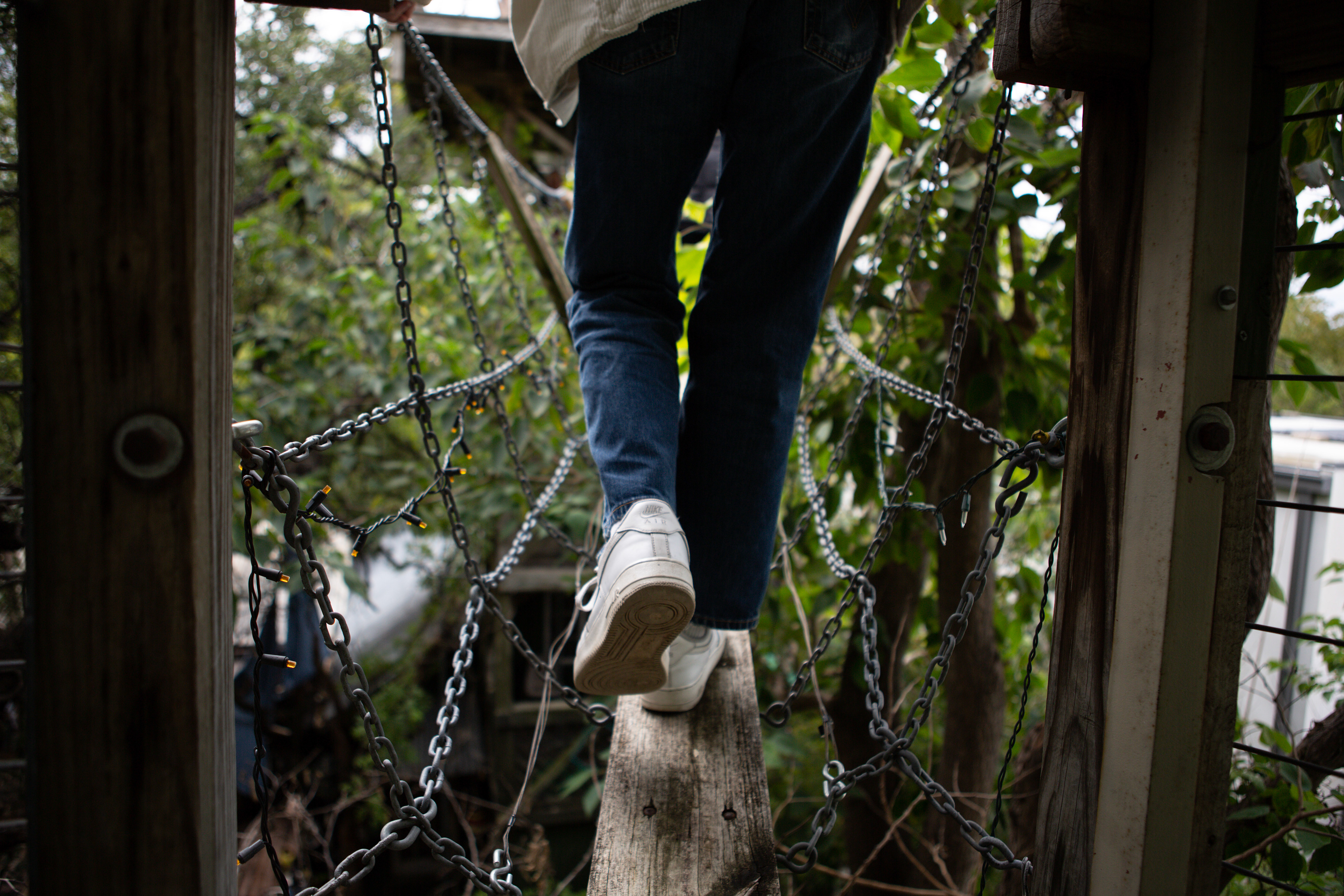 An attendee walks across the bridge on a tour of the house on Nov. 20, 2022.
