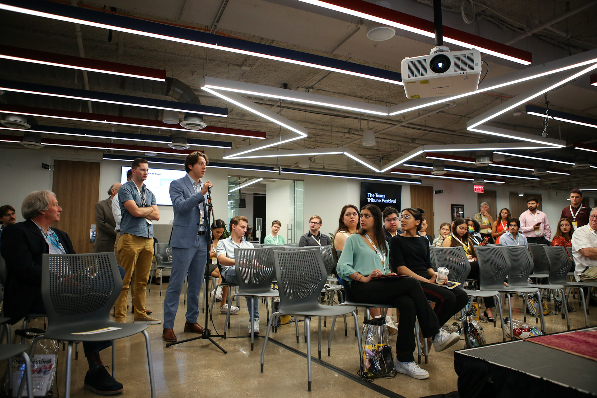 A festival goer asks a question at Texas Tribune Fest in Austin on Sept. 24, 2022.