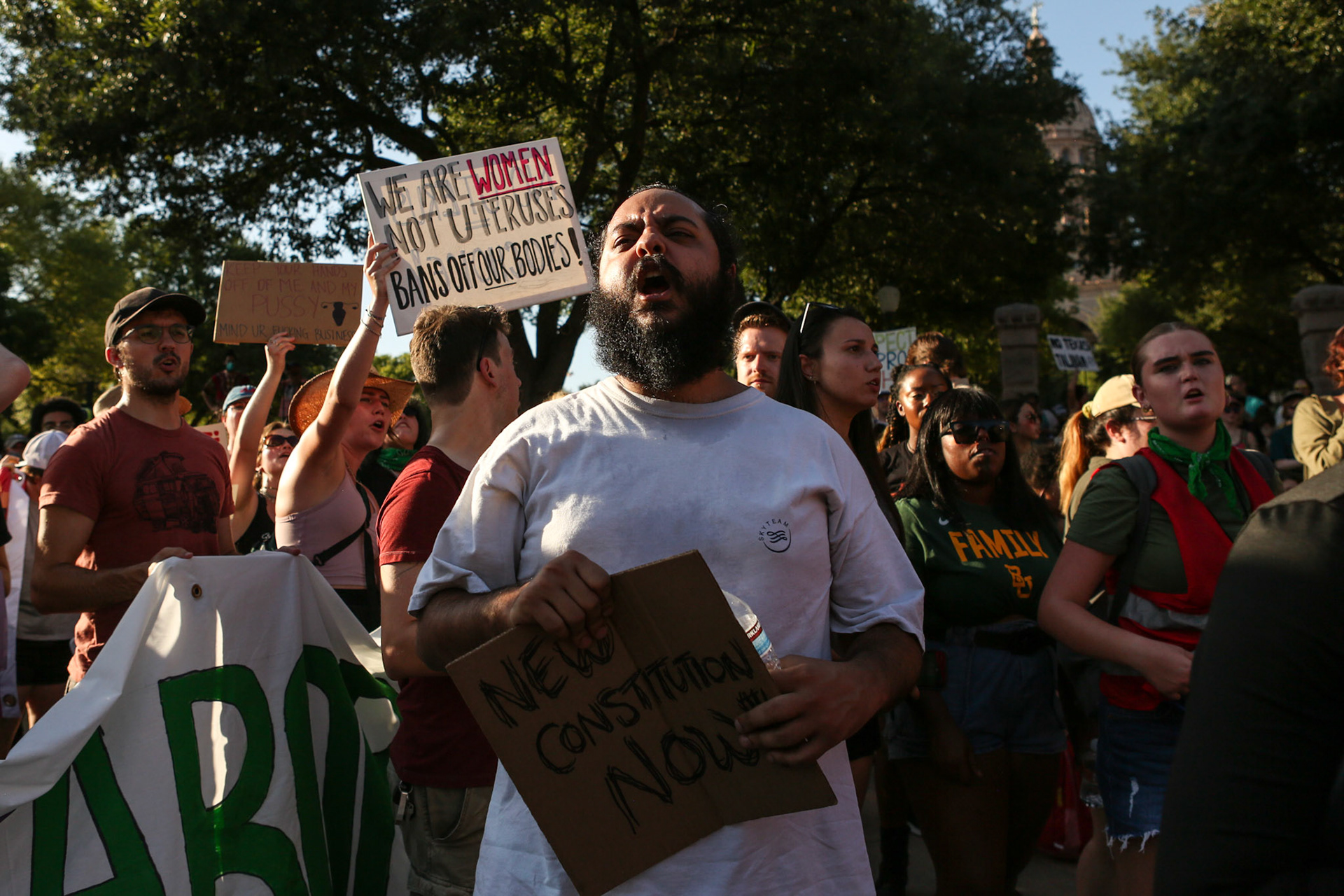 A man yells with the crowd in front of the Texas Capitol on June 24.