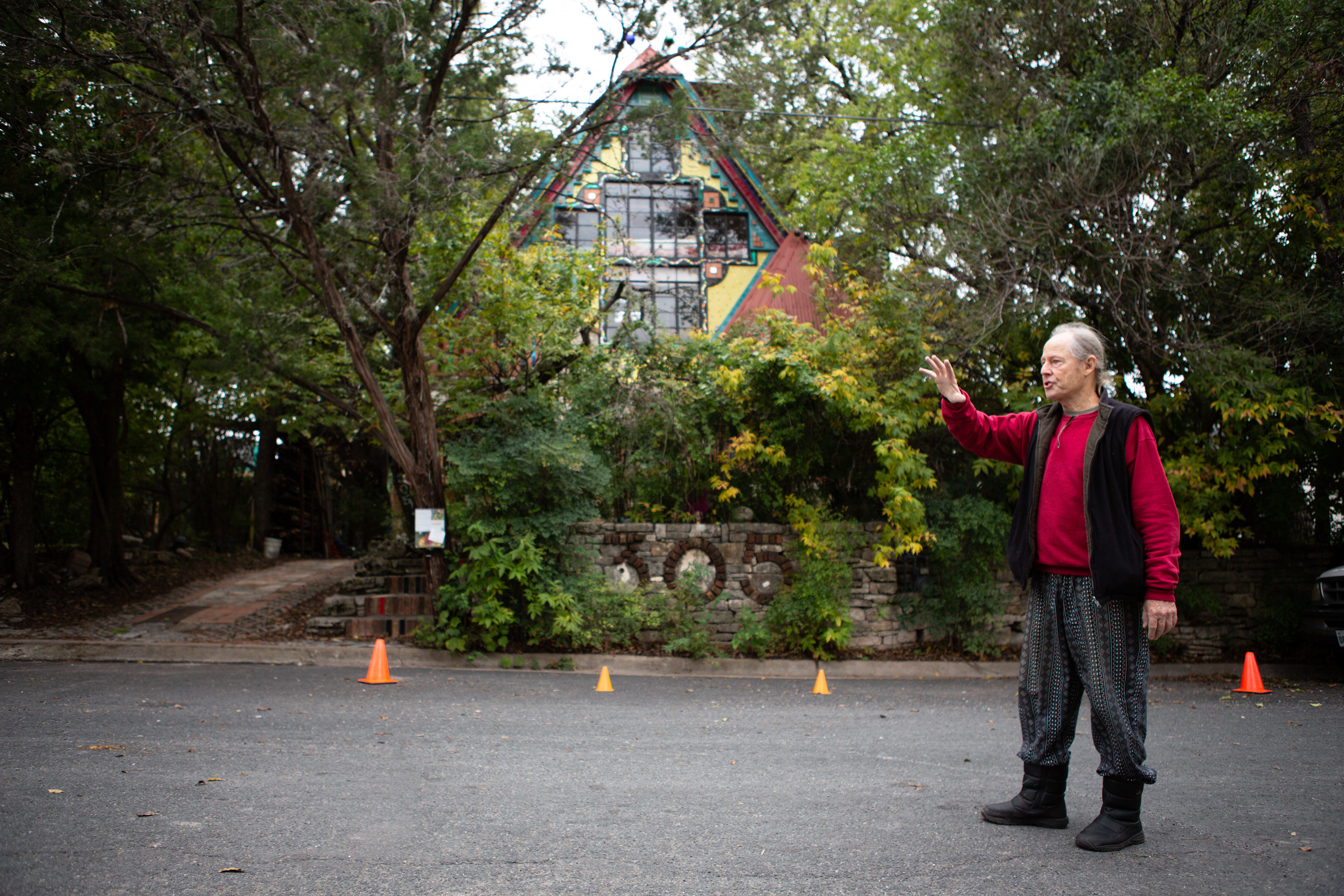 Talbot stands outside his house on Milton Street, two blocks from South Congress Avenue. His house has become a standing art piece located in a rapidly gentrifying area of Austin.