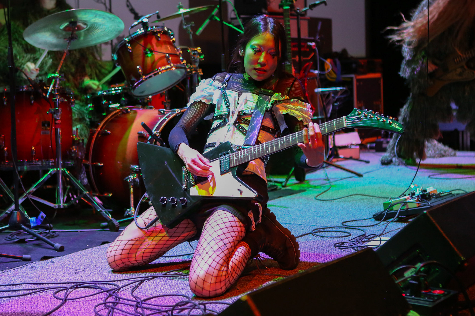 Artist SASAMI plays her guitar at the Austin Convention Center for SXSW on March 18, 2022.