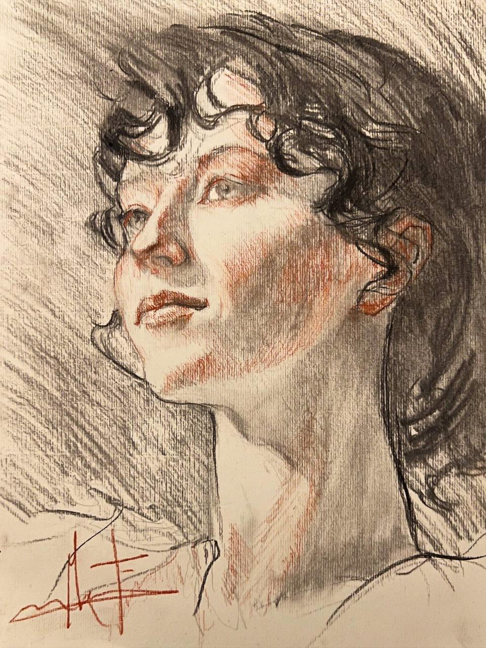 Portrait d'une femme au fusain et à la sanguine sur papier vergé