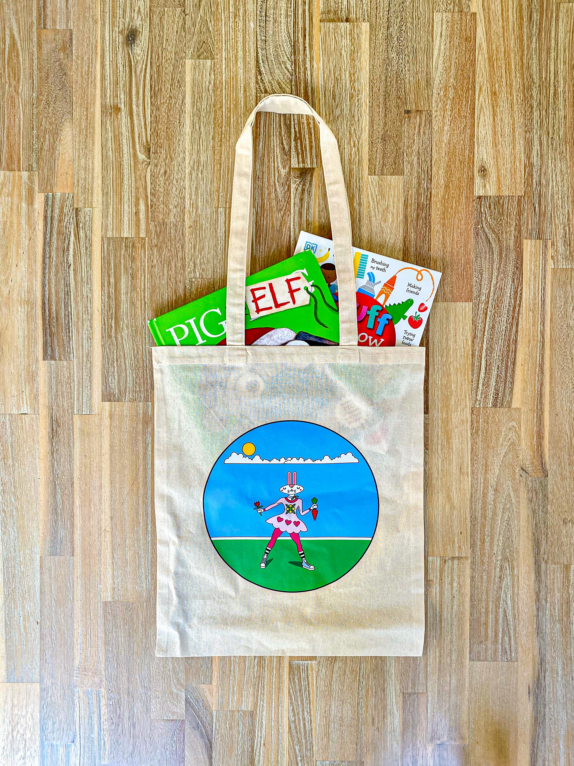 Cheeky Rabbit Tote Bag with props.