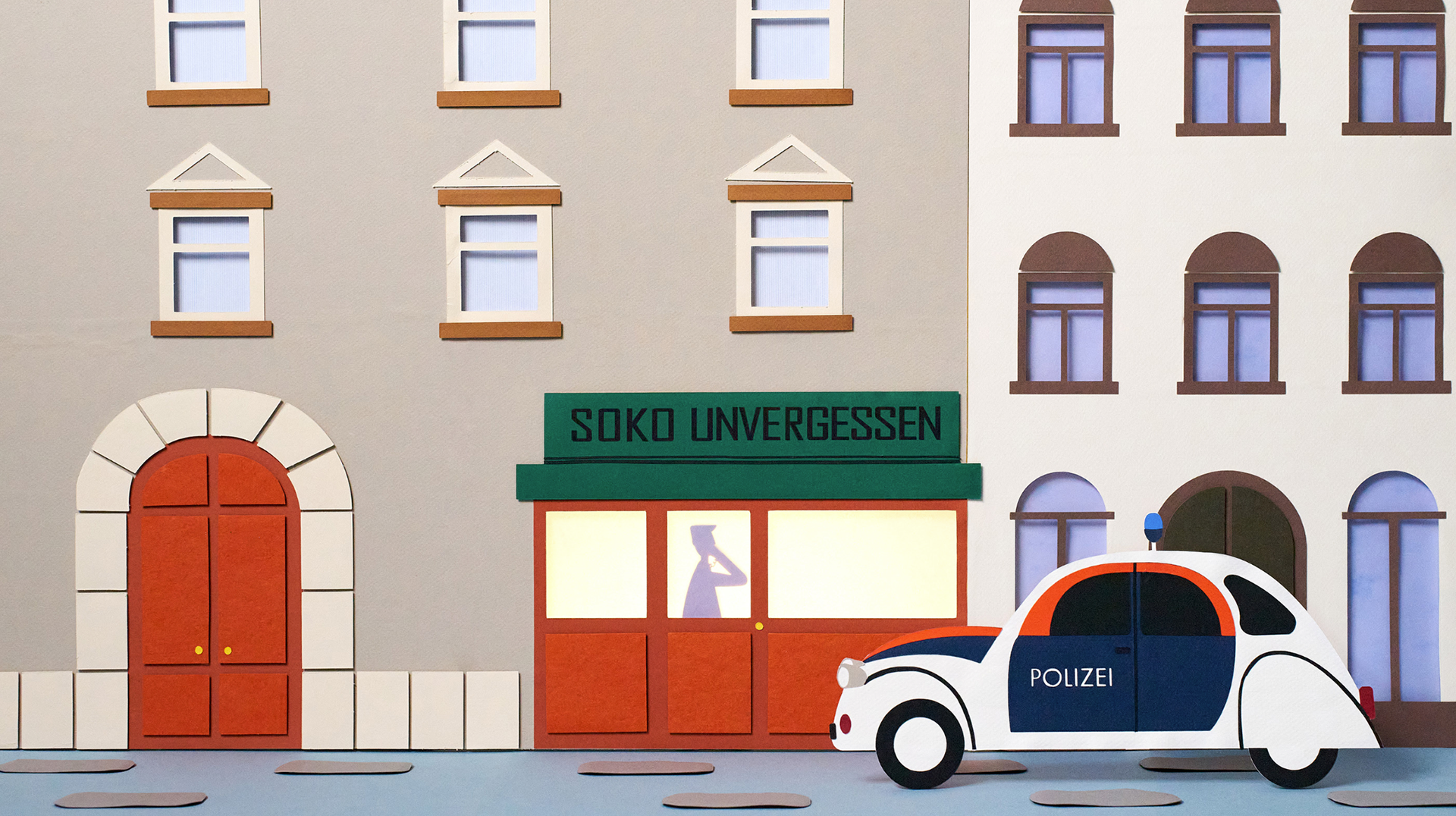 Paper set of a police station and car