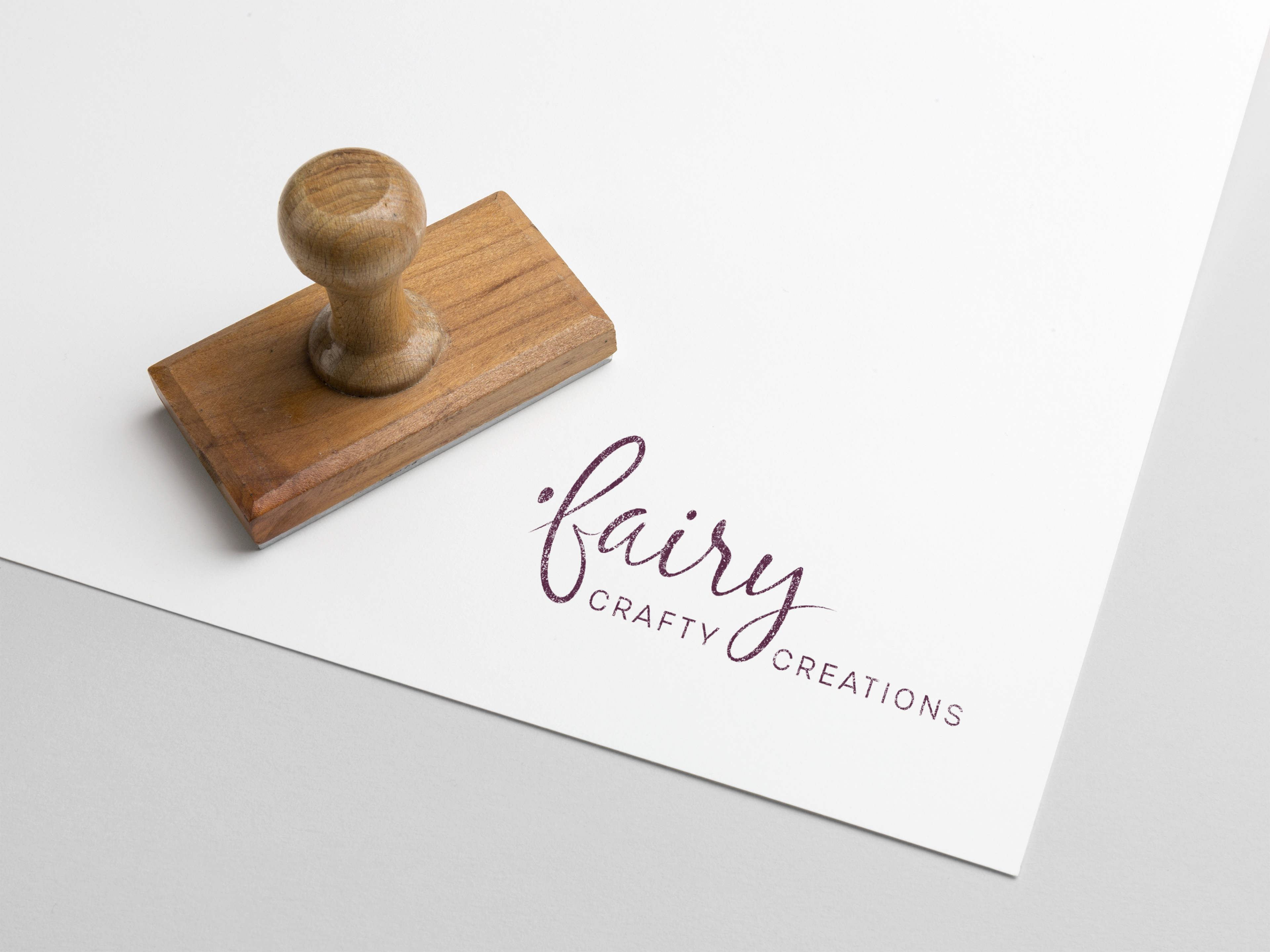 Fairy Crafty Creations modern, wordmark, minimal logo on white sheet of paper by E Graphics LLC
